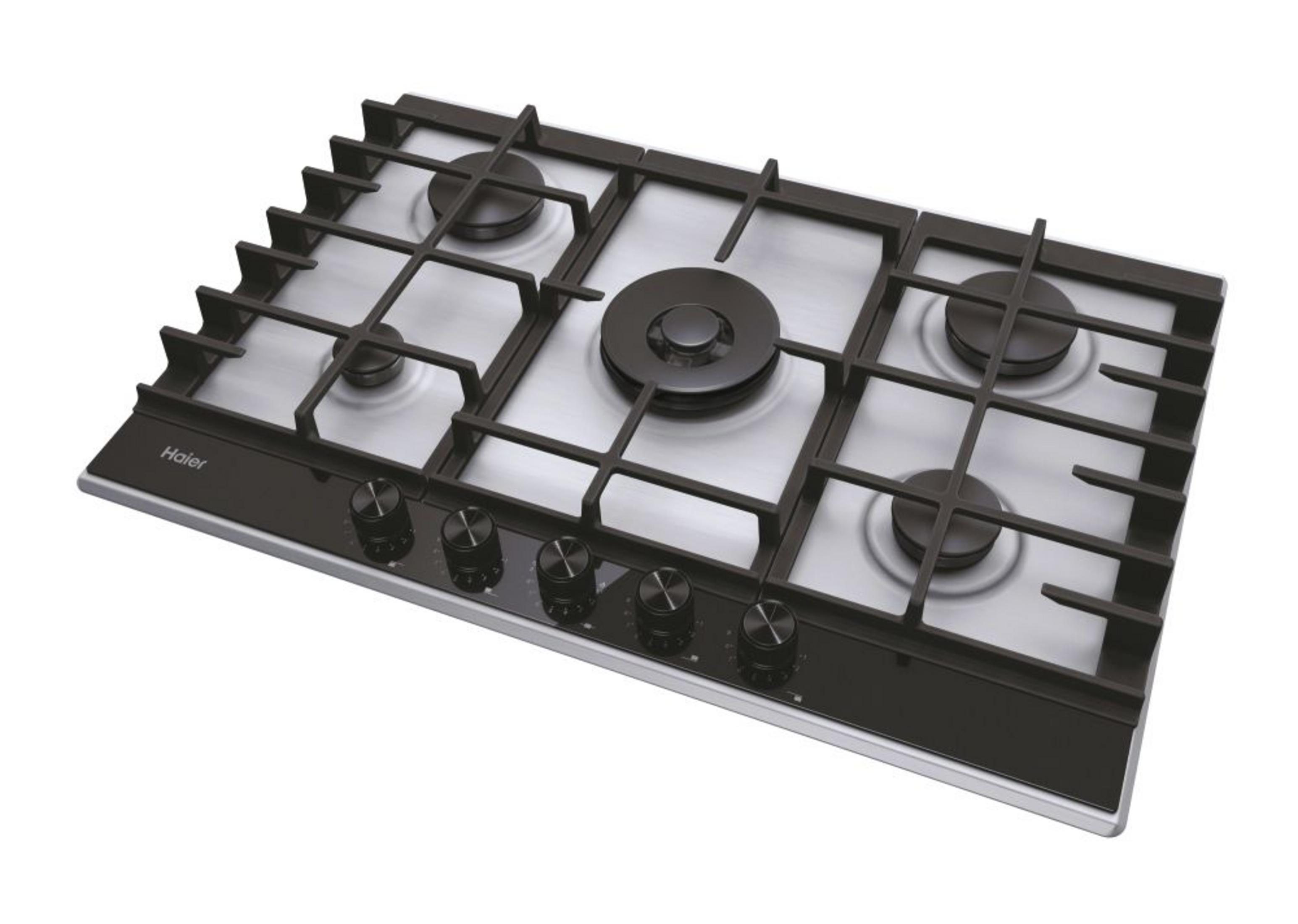 Srebrna płyta gazowa z czarnymi rusztami i pokrętłami.