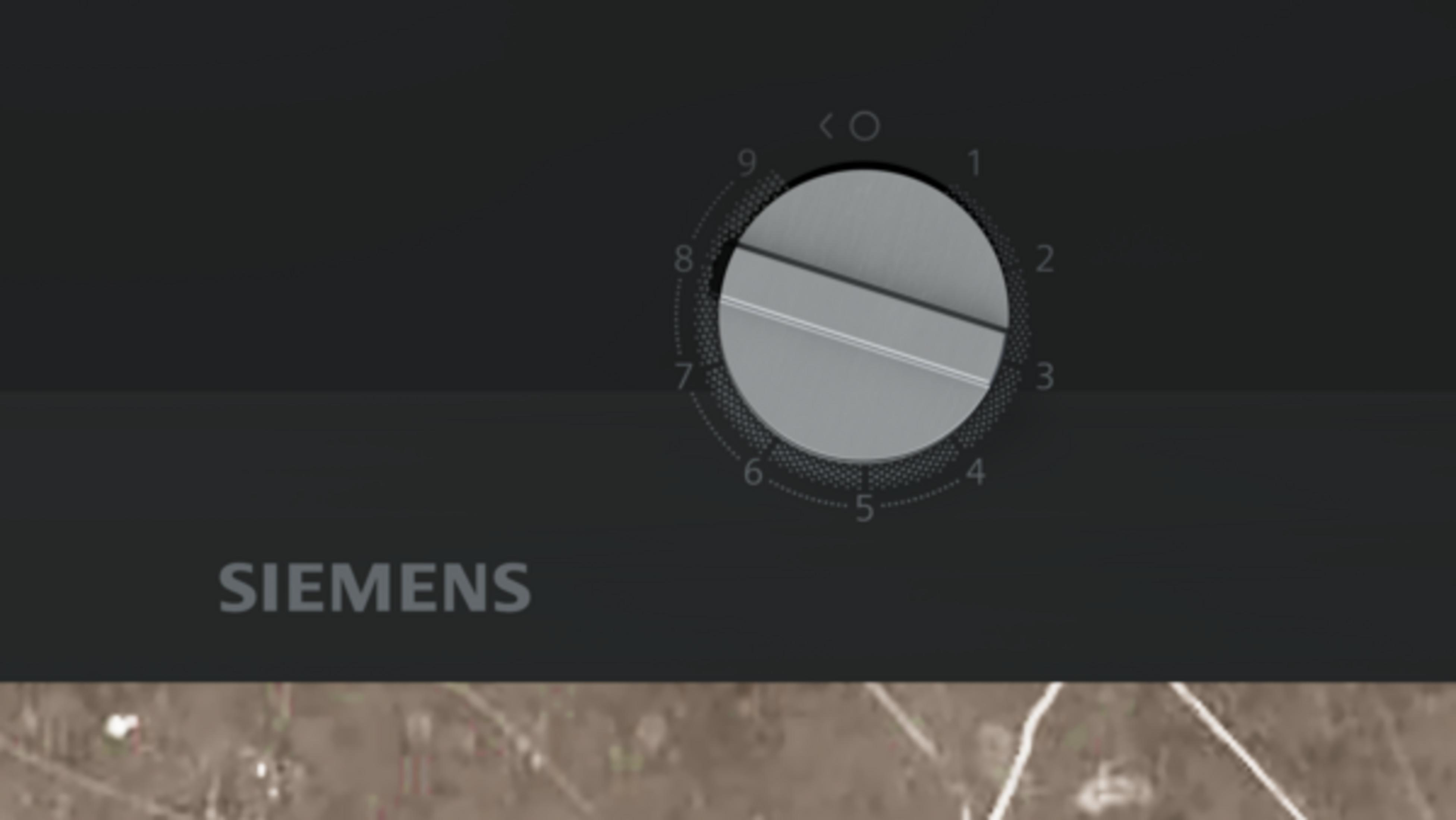 Un dial gris con números del 1 al 9 y el logo de Siemens.