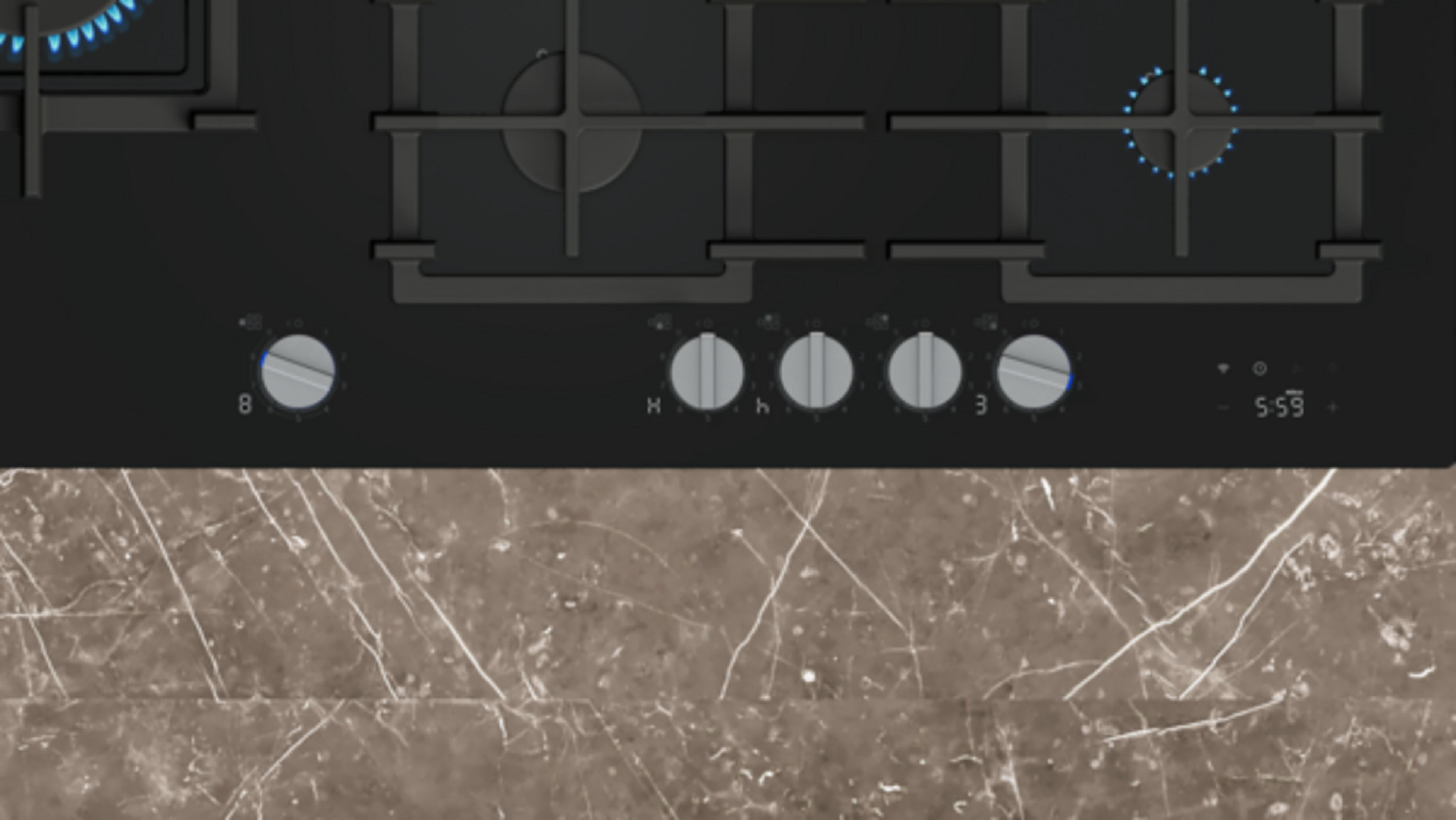 Czarna płyta gazowa z czterema palnikami i pokrętłami.