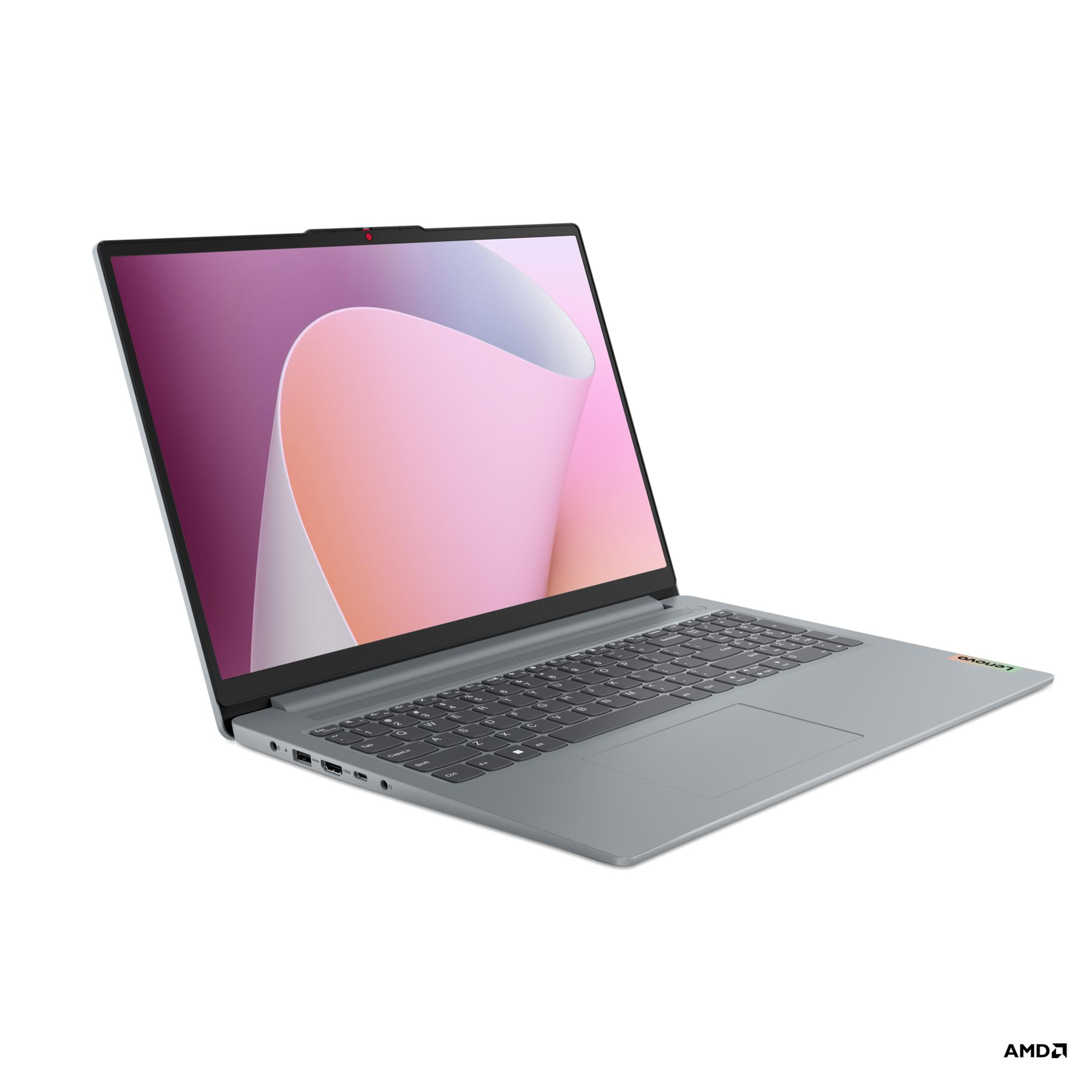 Ekranında renkli bir arka planı olan açık, gri bir Lenovo dizüstü bilgisayar.