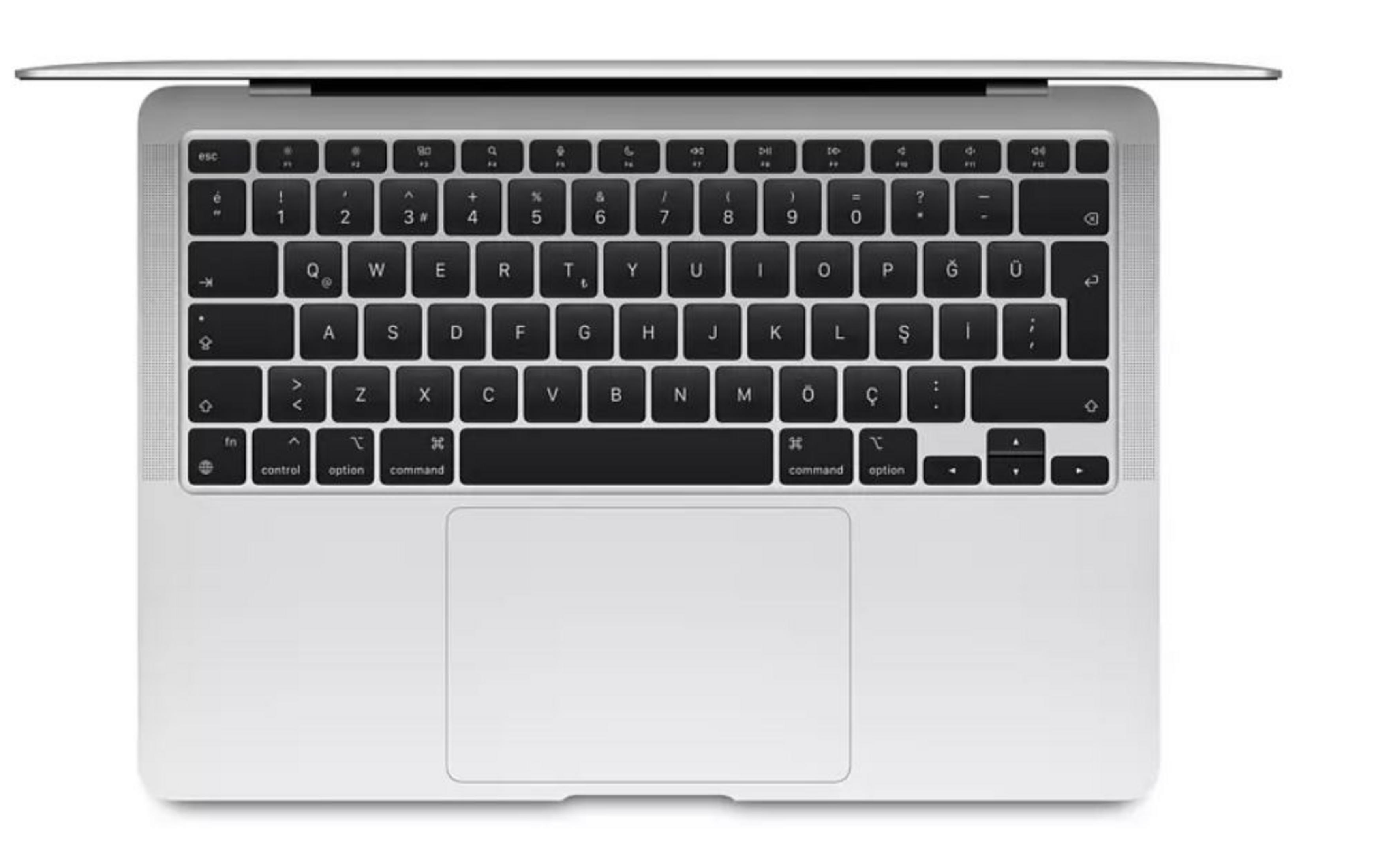 Srebrny MacBook z otwartą klawiaturą i dużym trackpadem.