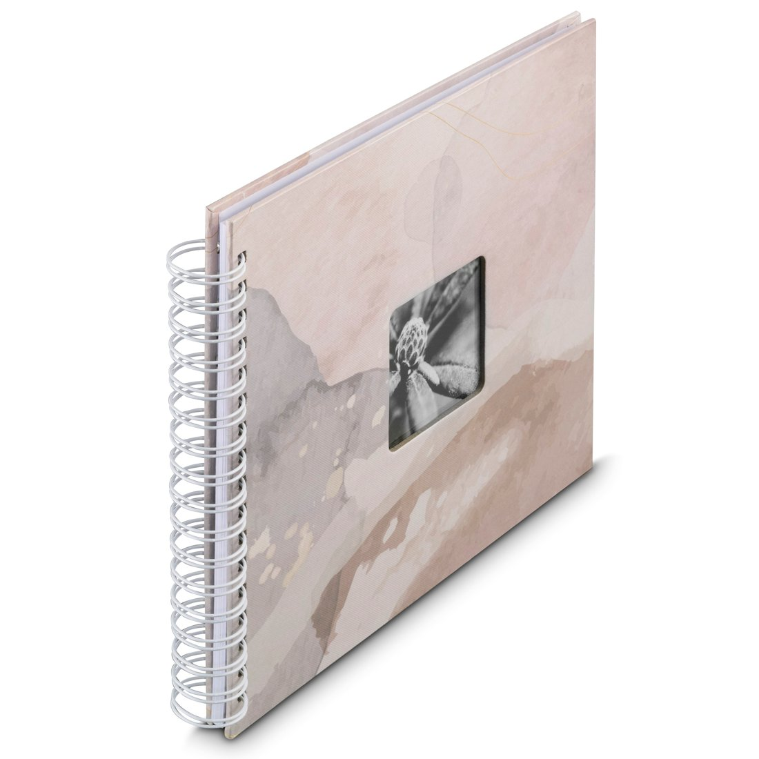 Album w spirali z obrazem łupiny nasiennej na okładce.