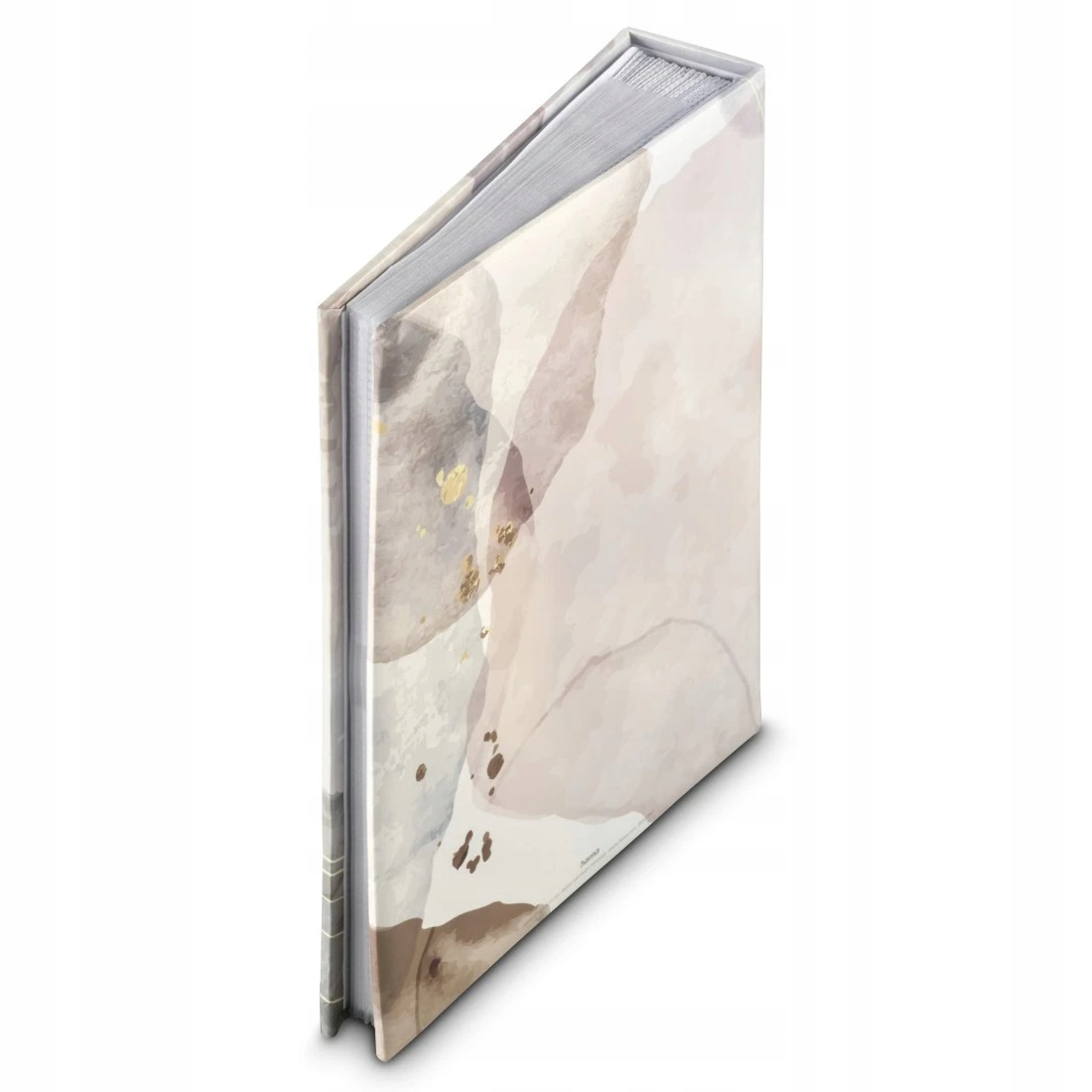 Notatnik z akwarelowym wzorem w odcieniach beżu i brązu ze złotymi akcentami.