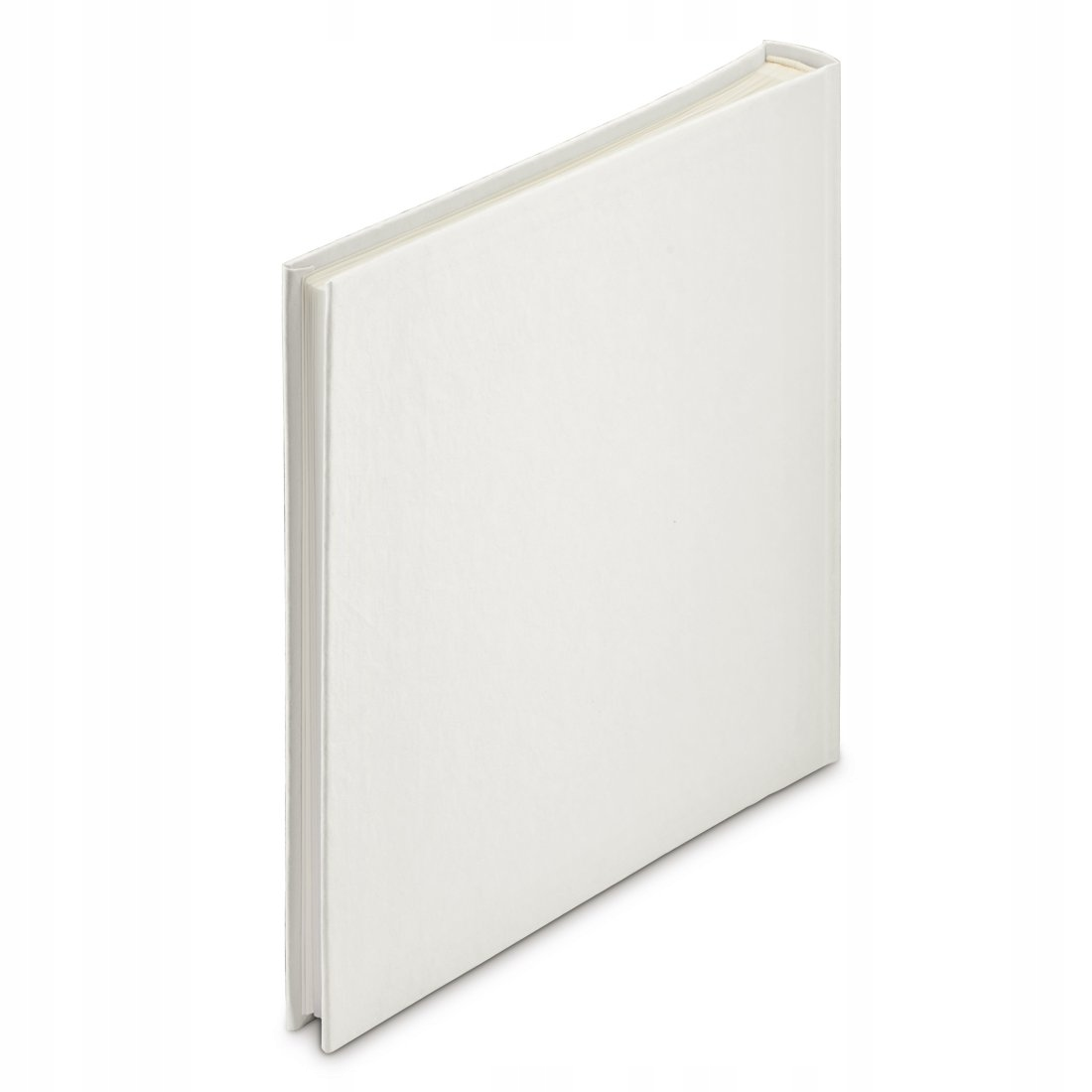 Zamknięta, biała książka z grubą okładką, leżąca ukośnie od lewej góry do prawego dołu.