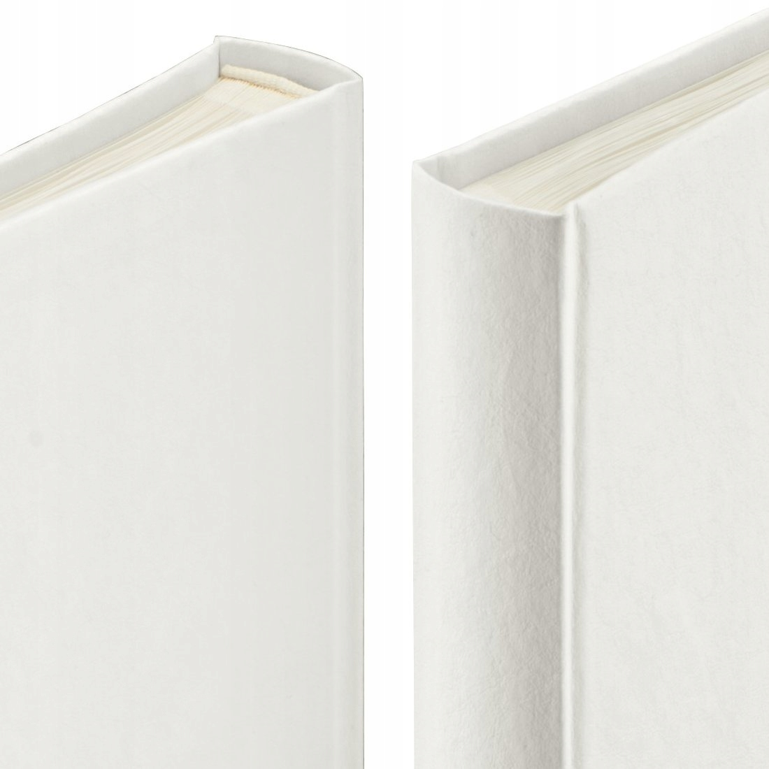 Dwa białe grzbiety książek z otwartymi stronami, zbliżenie.