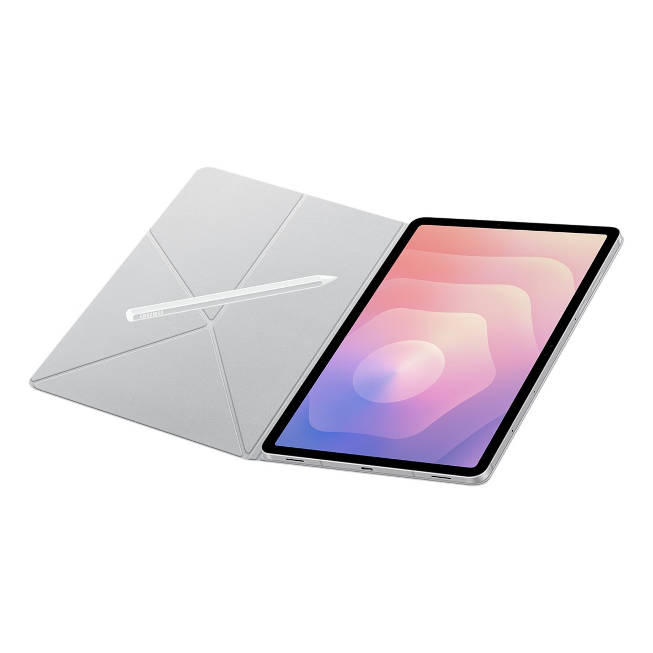 Srebrny tablet ze stylusem i okładką z geometrycznym wzorem.