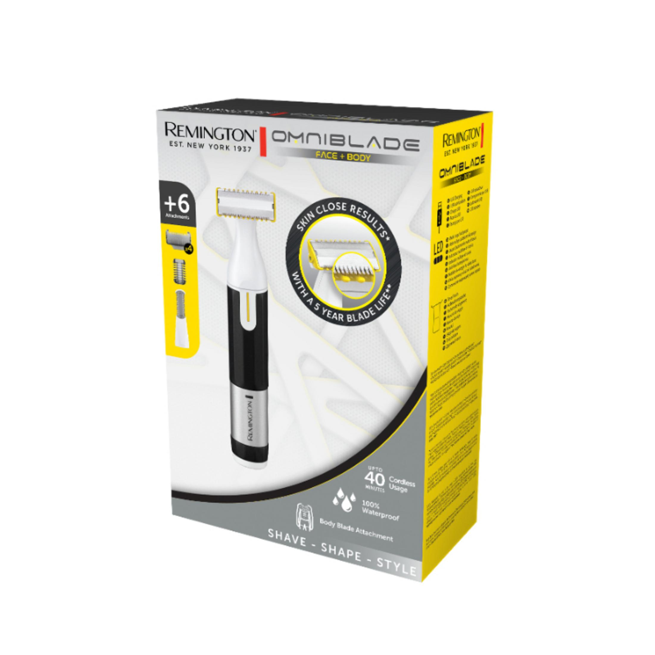 Verpackung eines Remington Omniblade Trimmers mit Zubehör. Schwarz und Gelb.