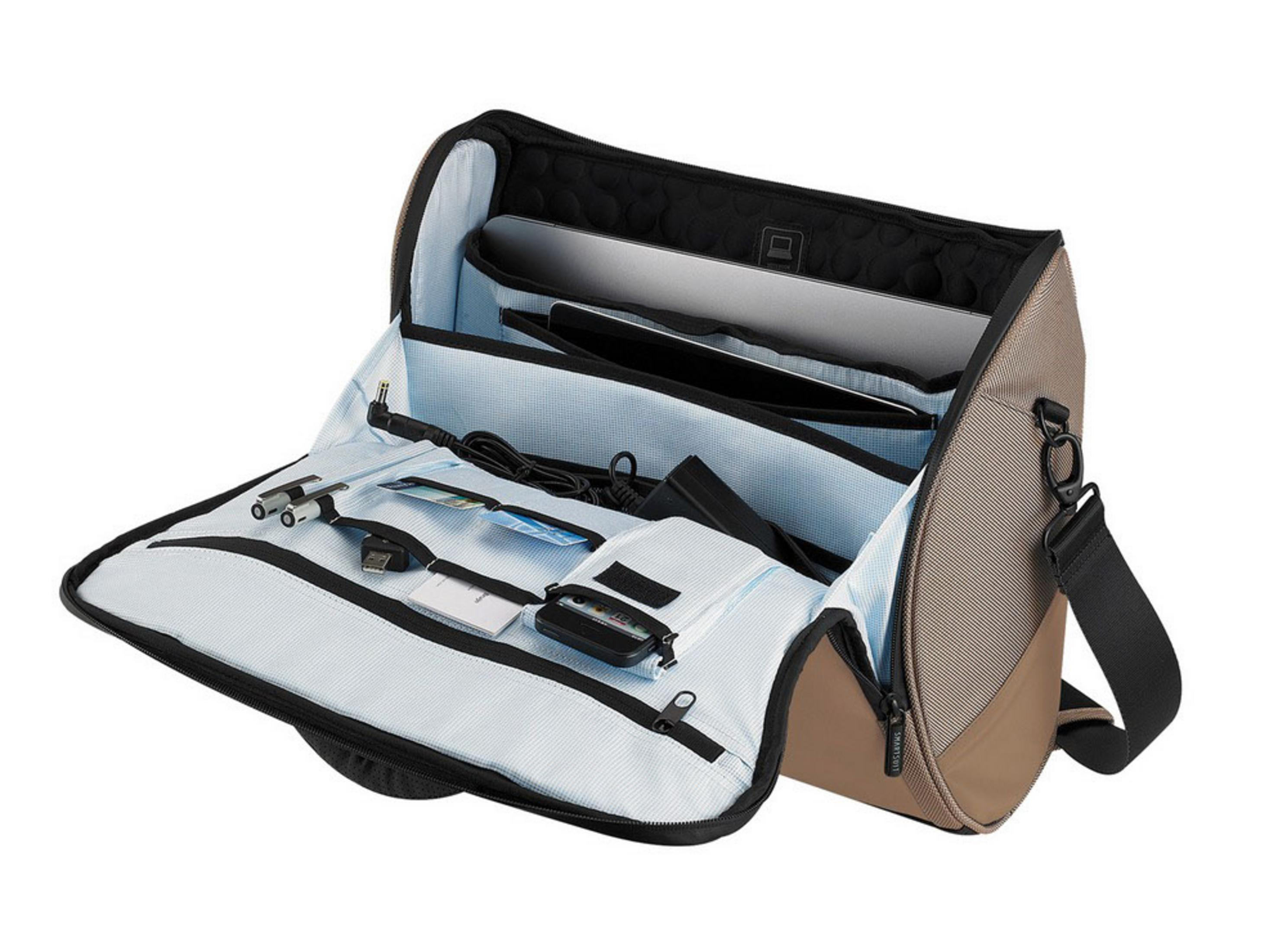 An open brown and tan bag with laptops, cables, and cards inside.