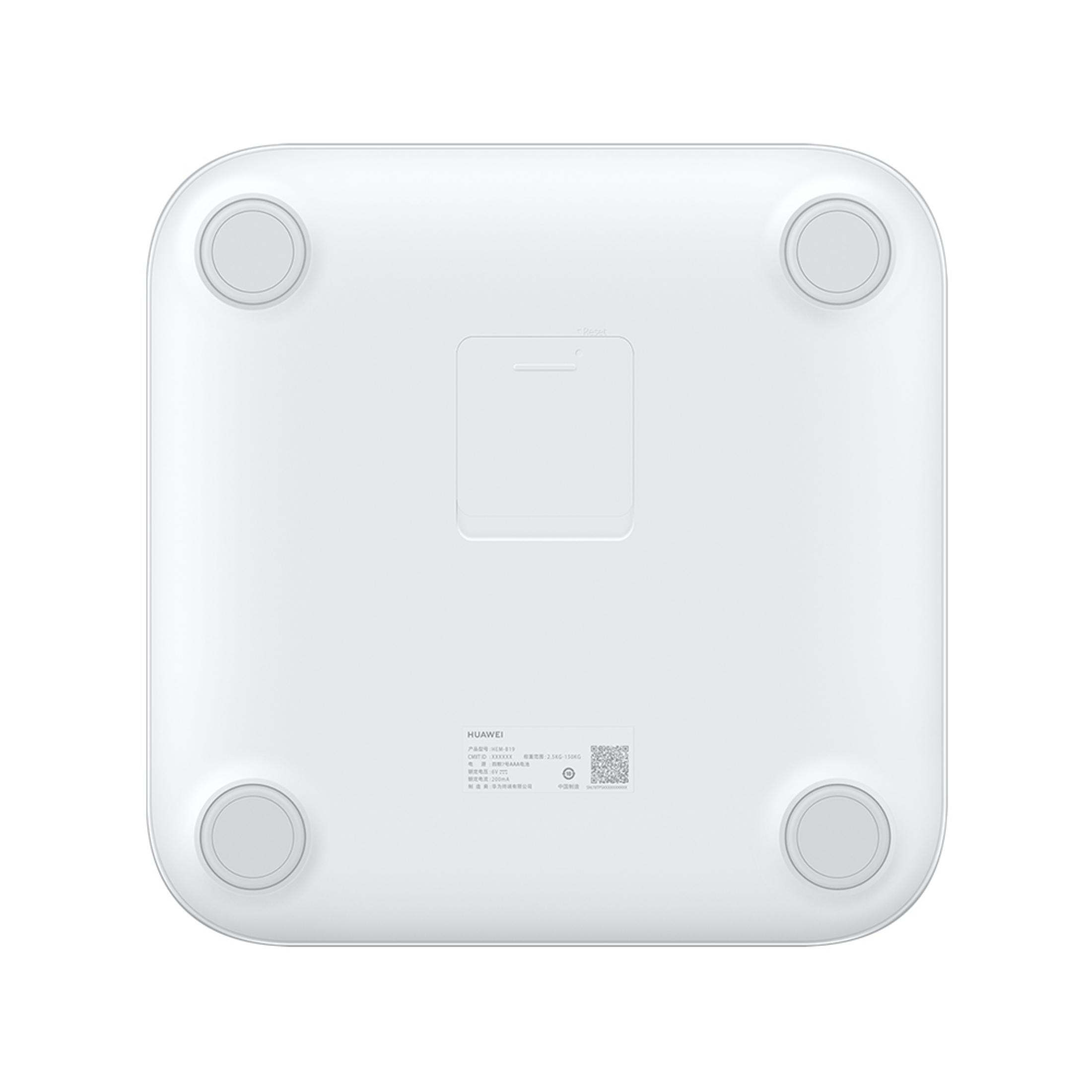 Biała waga Huawei z czterema gumowymi nóżkami i przyciskiem reset.