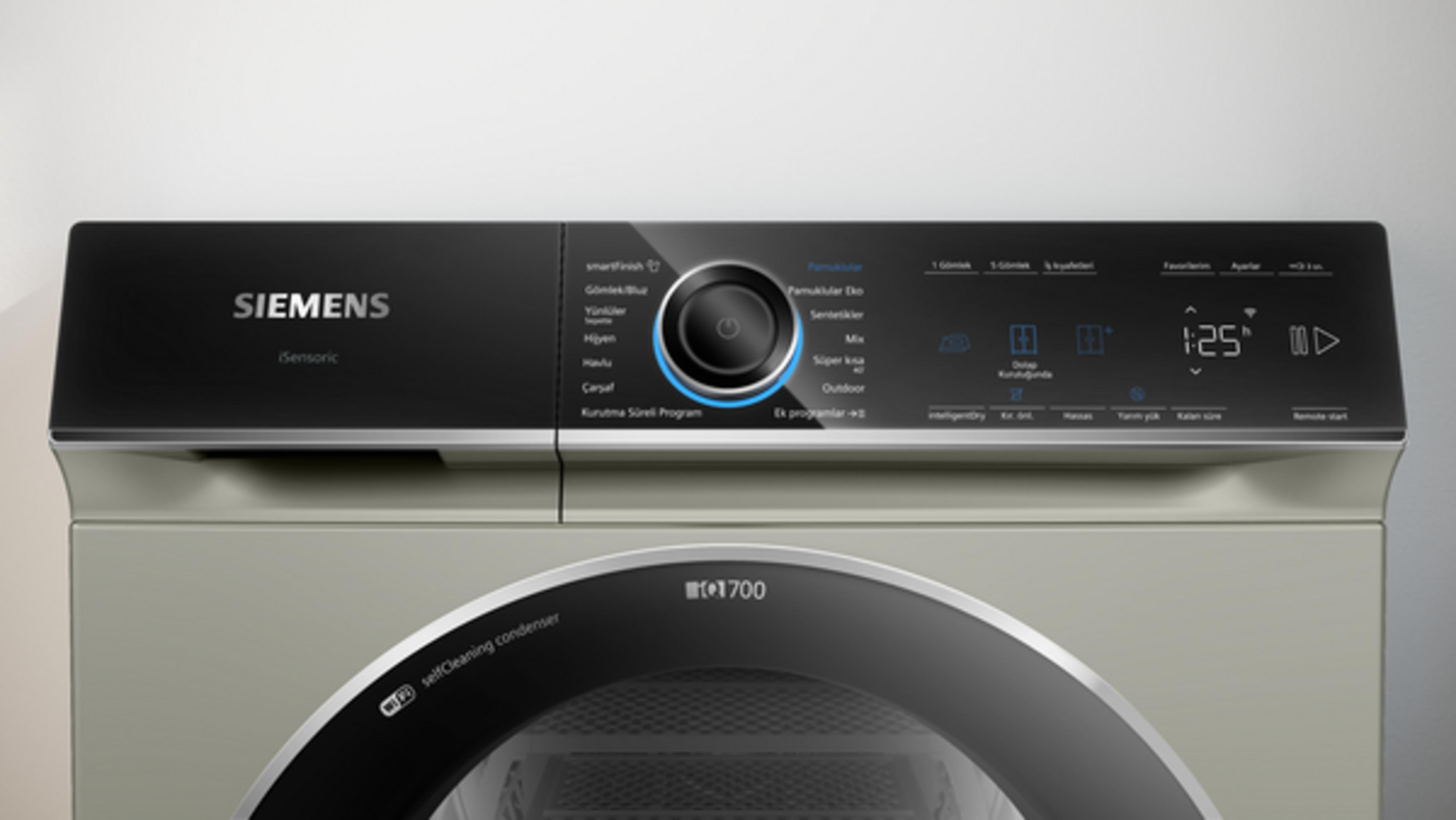 Siemens çamaşır makinesi kontrol panelinin düğme ve dijital ekranlı yakın çekimi.