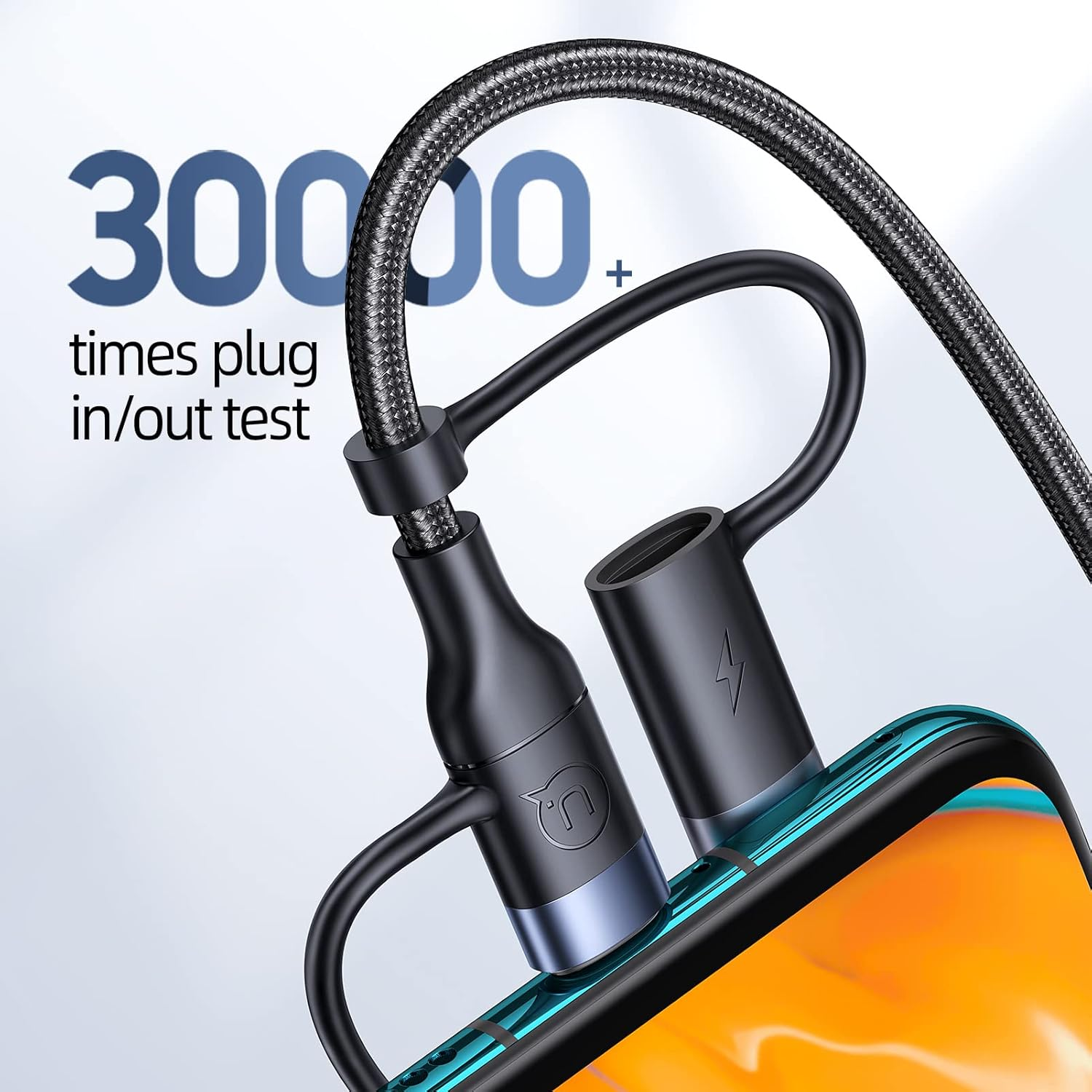 Czarny kabel ładujący z magnetycznym złączem podłączonym do smartfona.