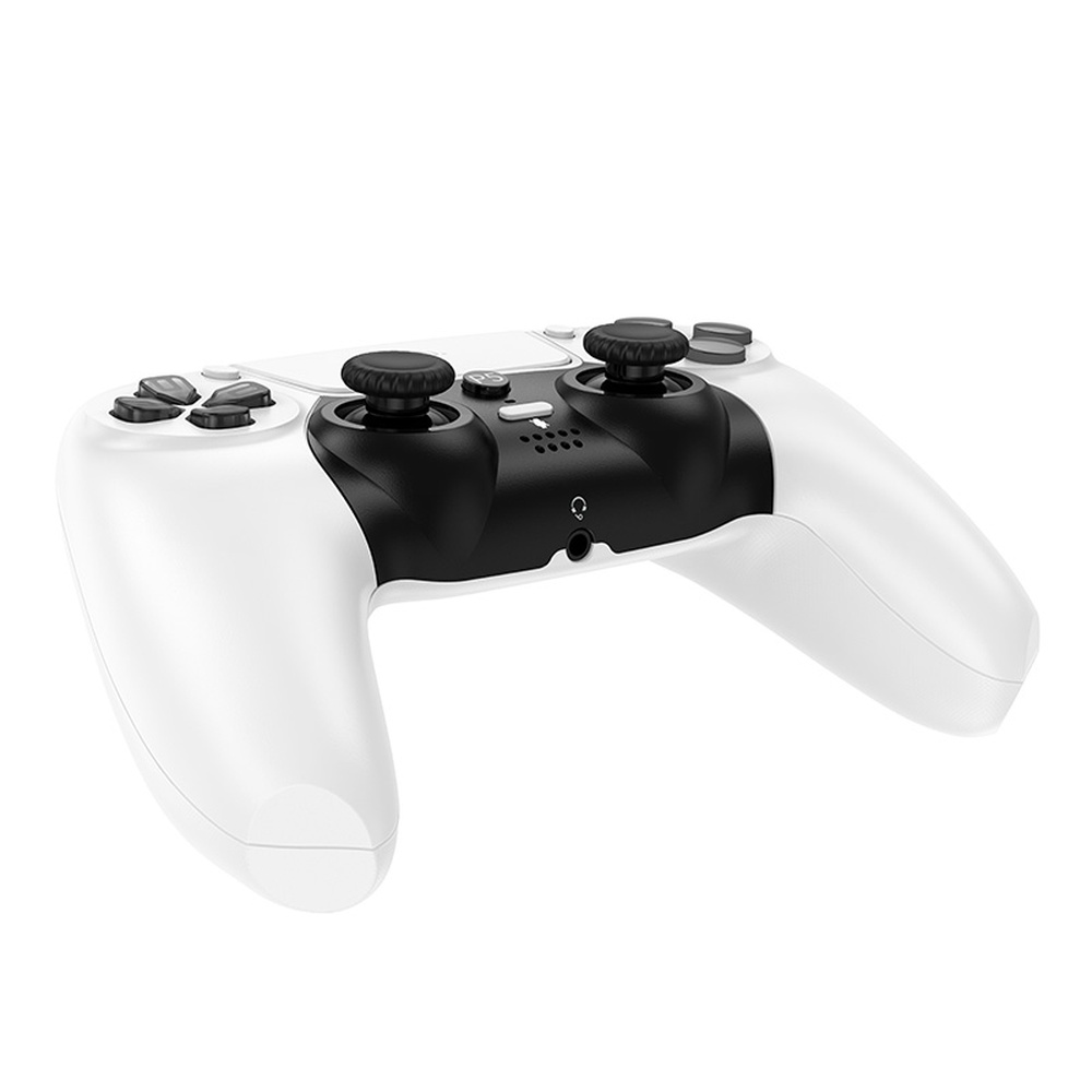 Un mando de videojuegos blanco y negro con joysticks y botones.