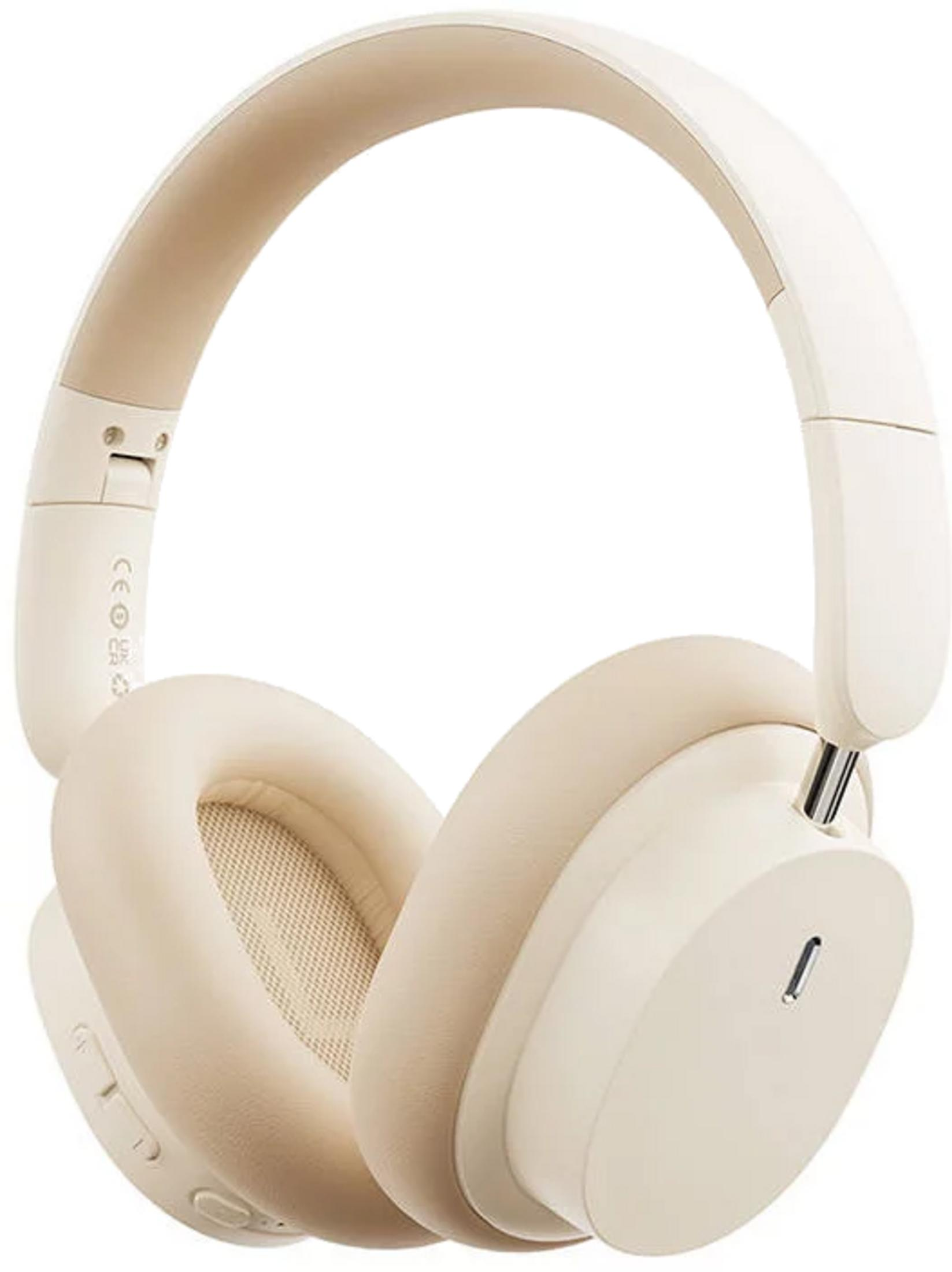 Unos auriculares beige con almohadillas acolchadas y diadema.