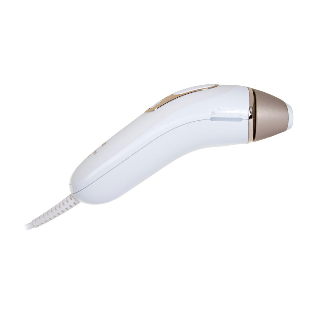 Białe urządzenie do depilacji IPL ze złotymi akcentami i kablem.