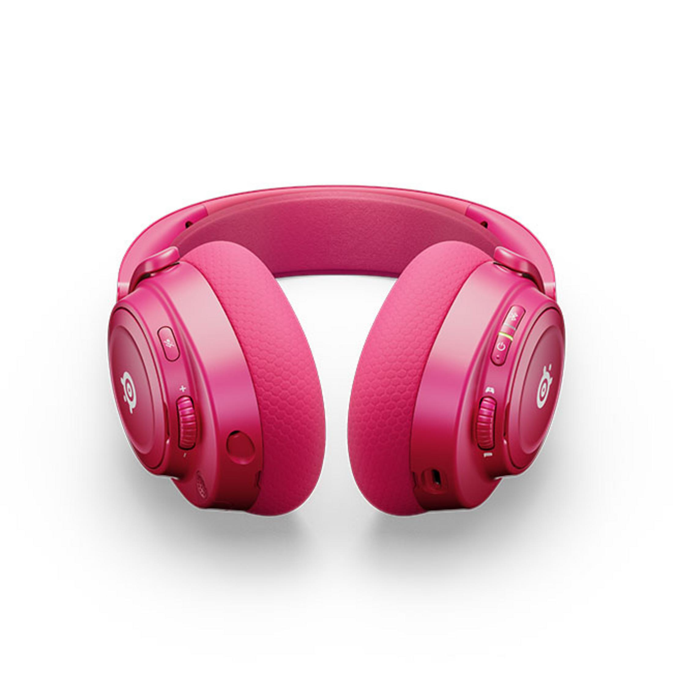 Un paio di cuffie rosa acceso con paraorecchie imbottiti e archetto.