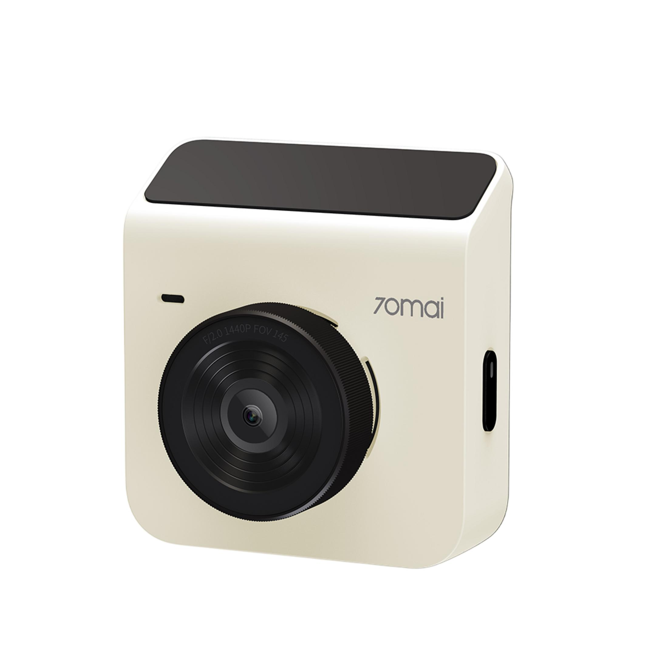 Una dashcam 70mai beige con obiettivo nero e pannello superiore nero.