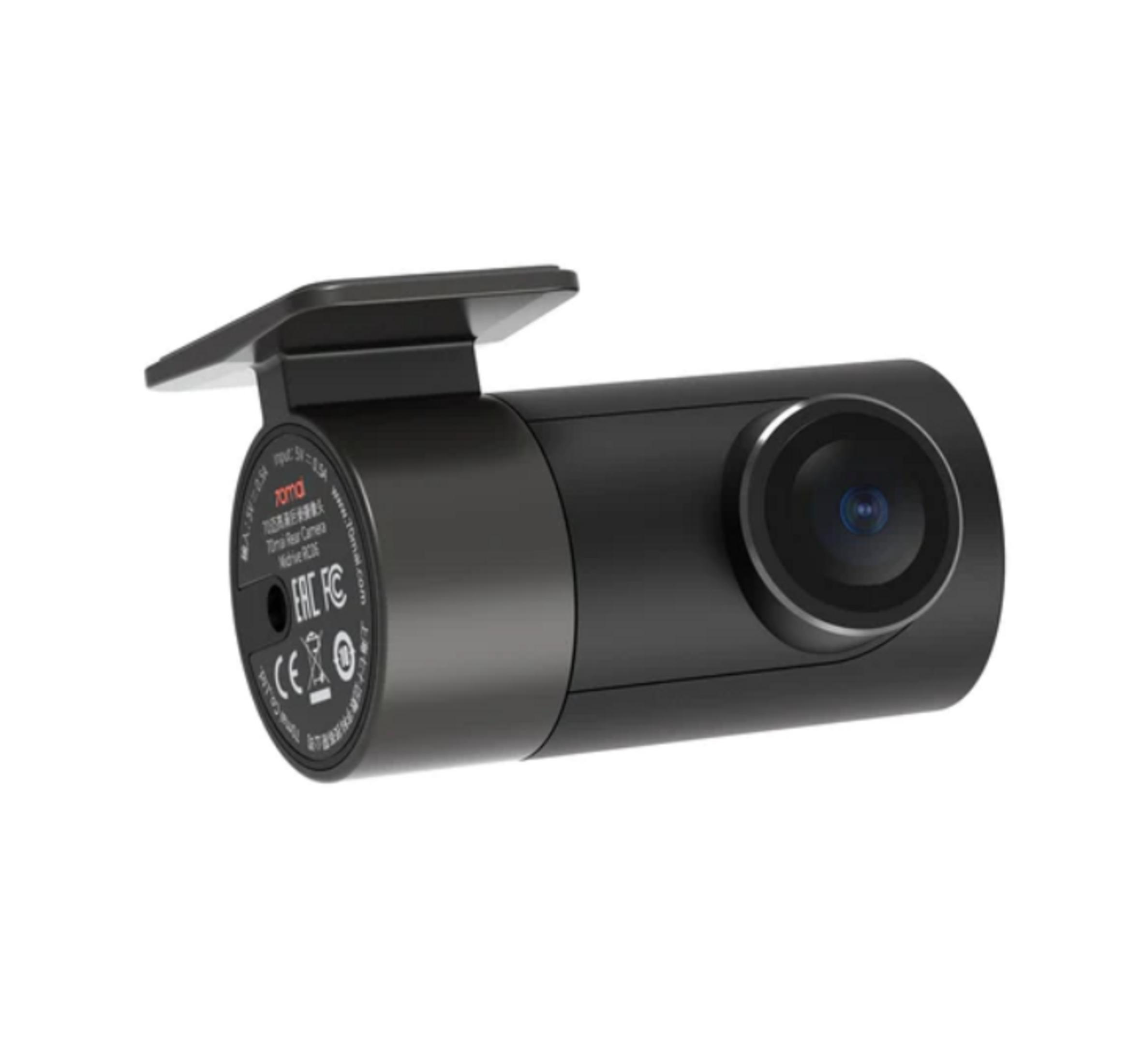 Czarna kamera samochodowa z obiektywem i mocowaniem. Etykiety po bokach.