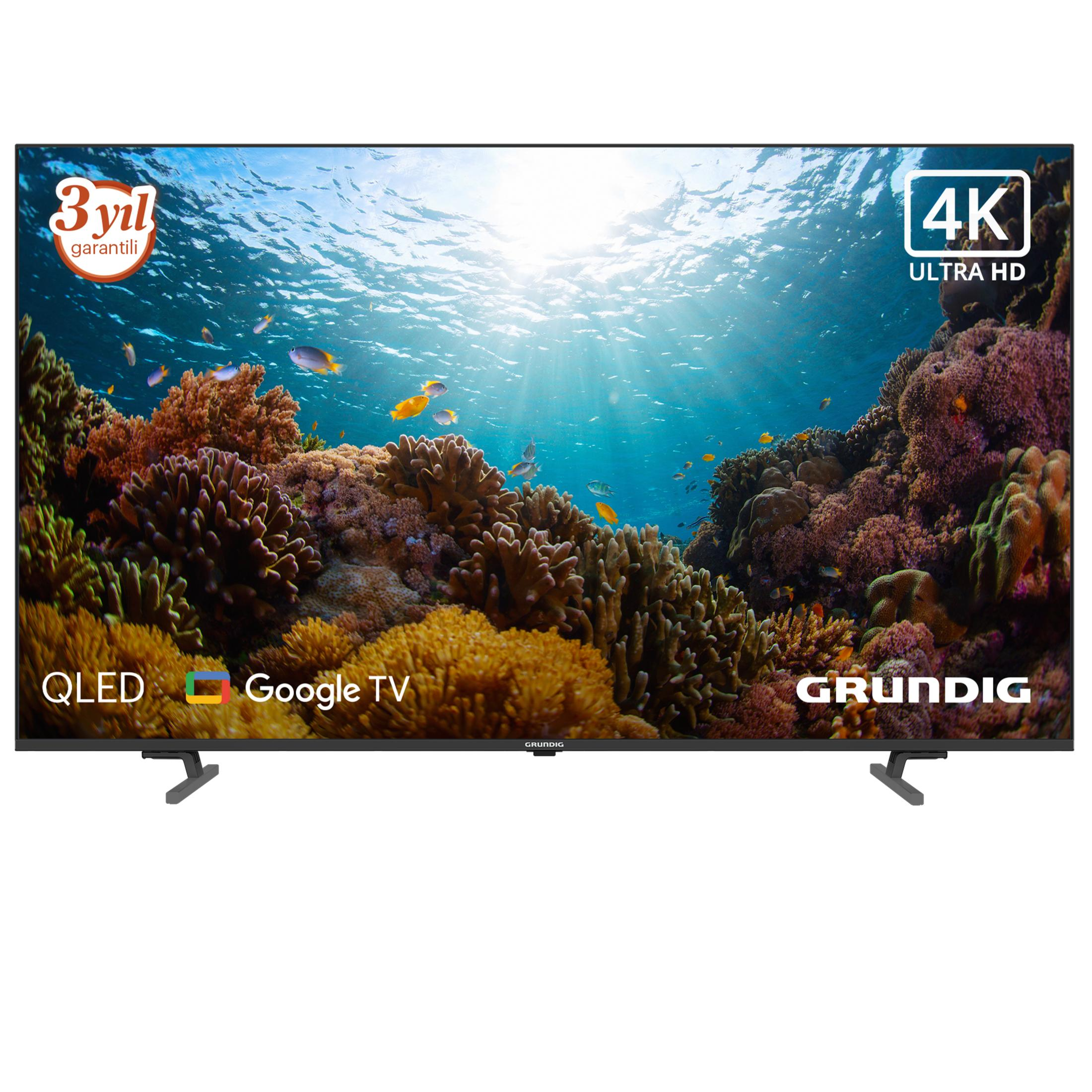 Grundig QLED 4K TV mercanlar ve balıklarla dolu su altı manzarası gösteriyor.