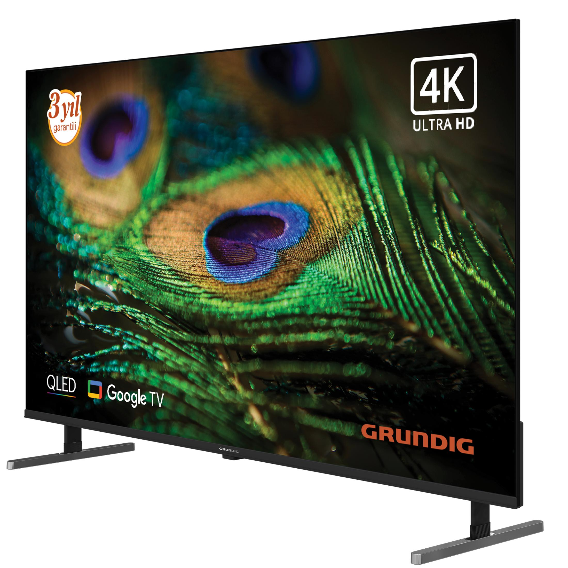 4K Ultra HD ekrana sahip Grundig QLED Google TV, tavus kuşu tüyü deseni gösteriyor.