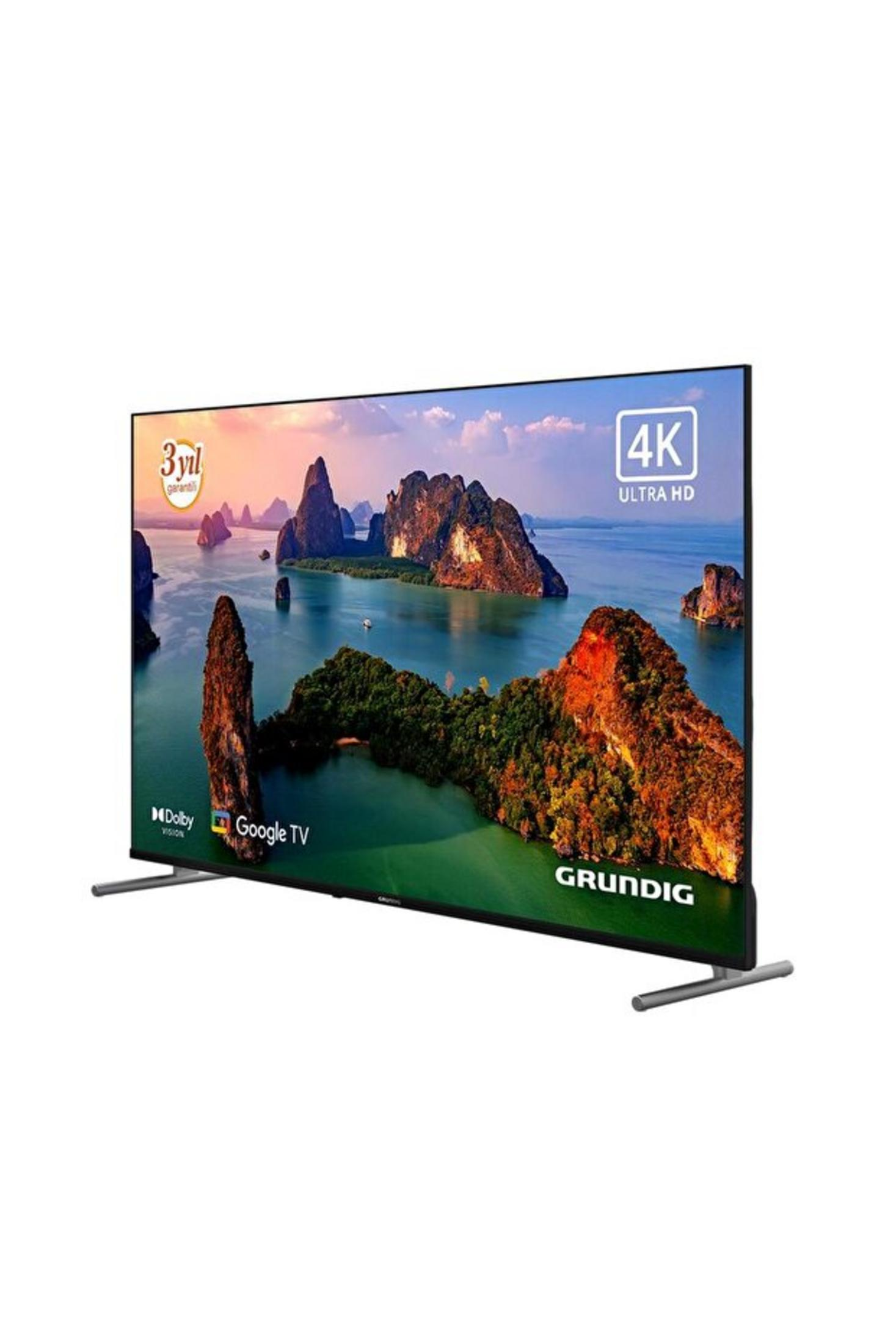 Google TV ve Dolby Vision özellikli 4K Grundig TV tropik ada manzarası gösteriyor.