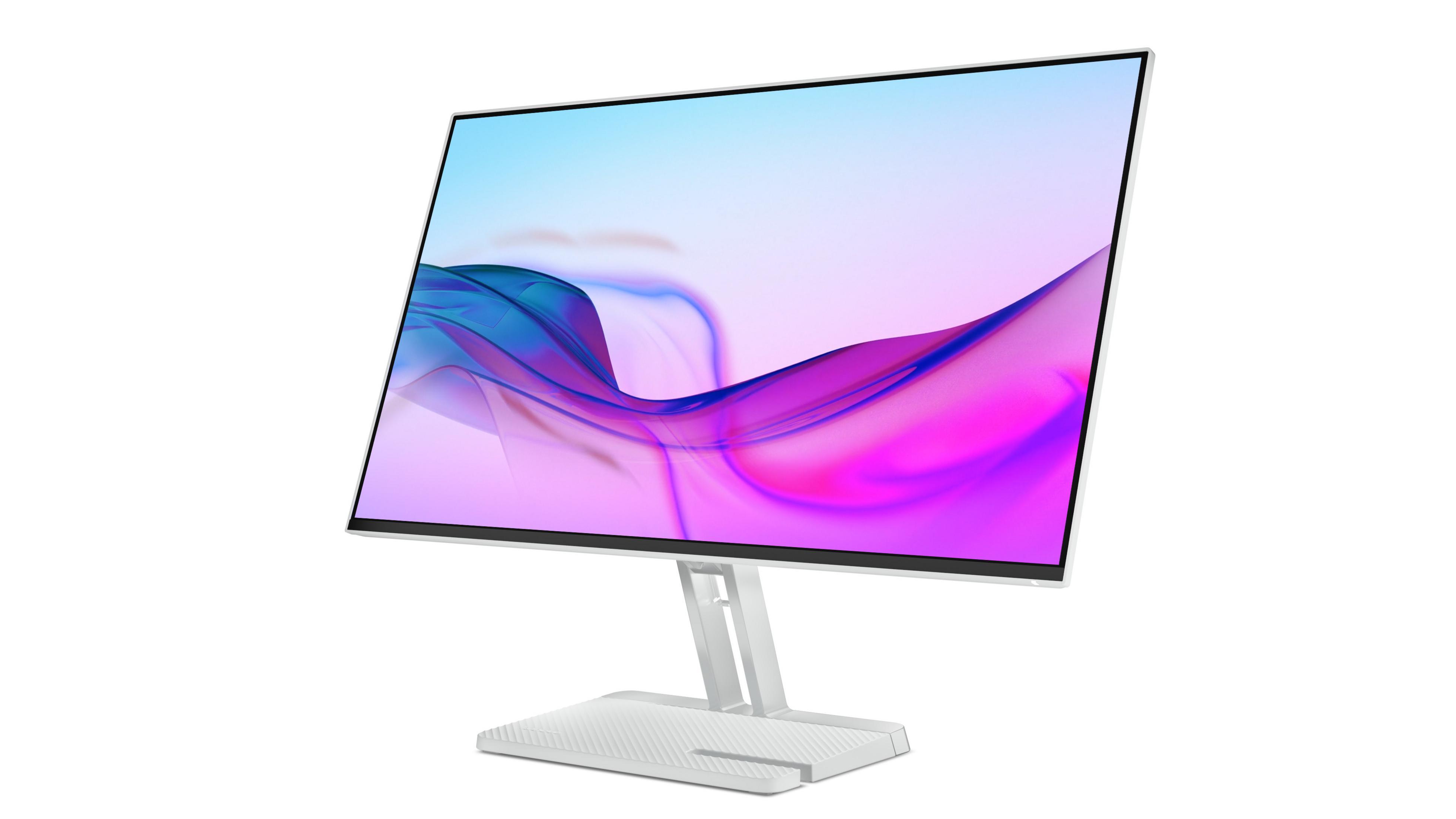 Soyut, renkli bir arka planı gösteren modern beyaz bir bilgisayar monitörü.