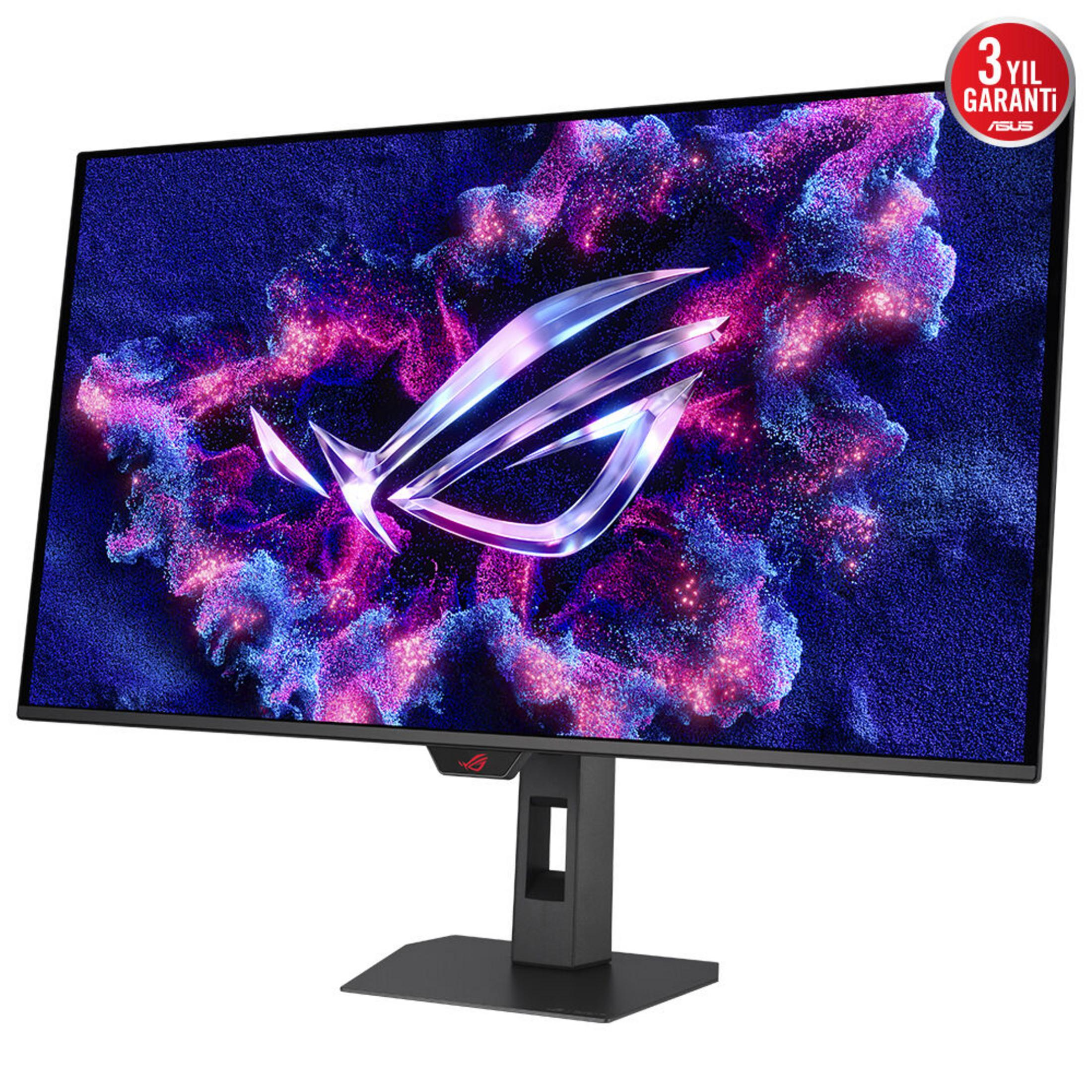 Un moniteur gaming affiche un logo stylisé sur fond violet et bleu.