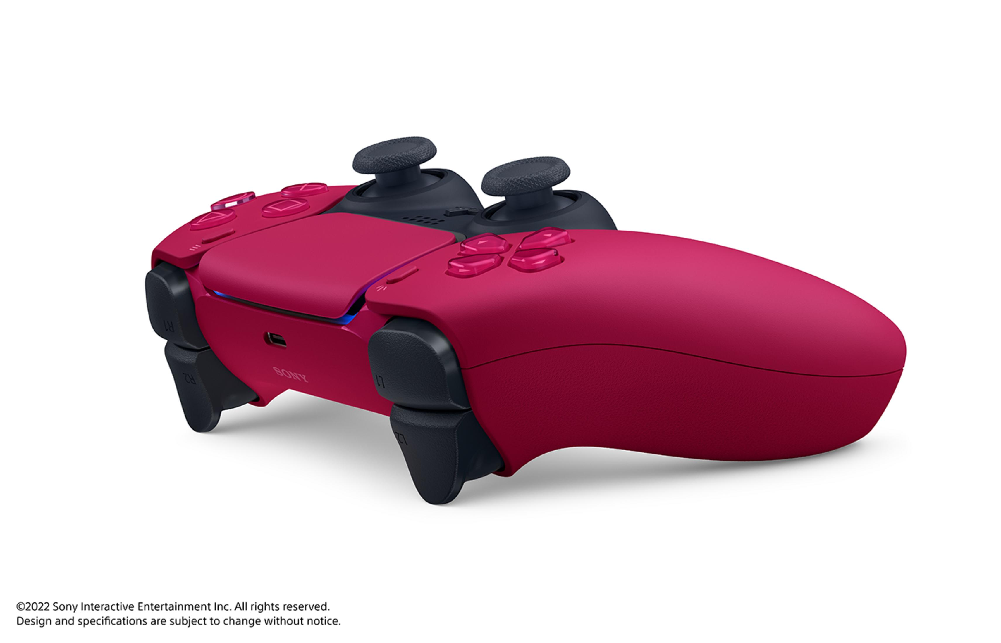 Un controller rosa con joystick e pulsanti scuri.