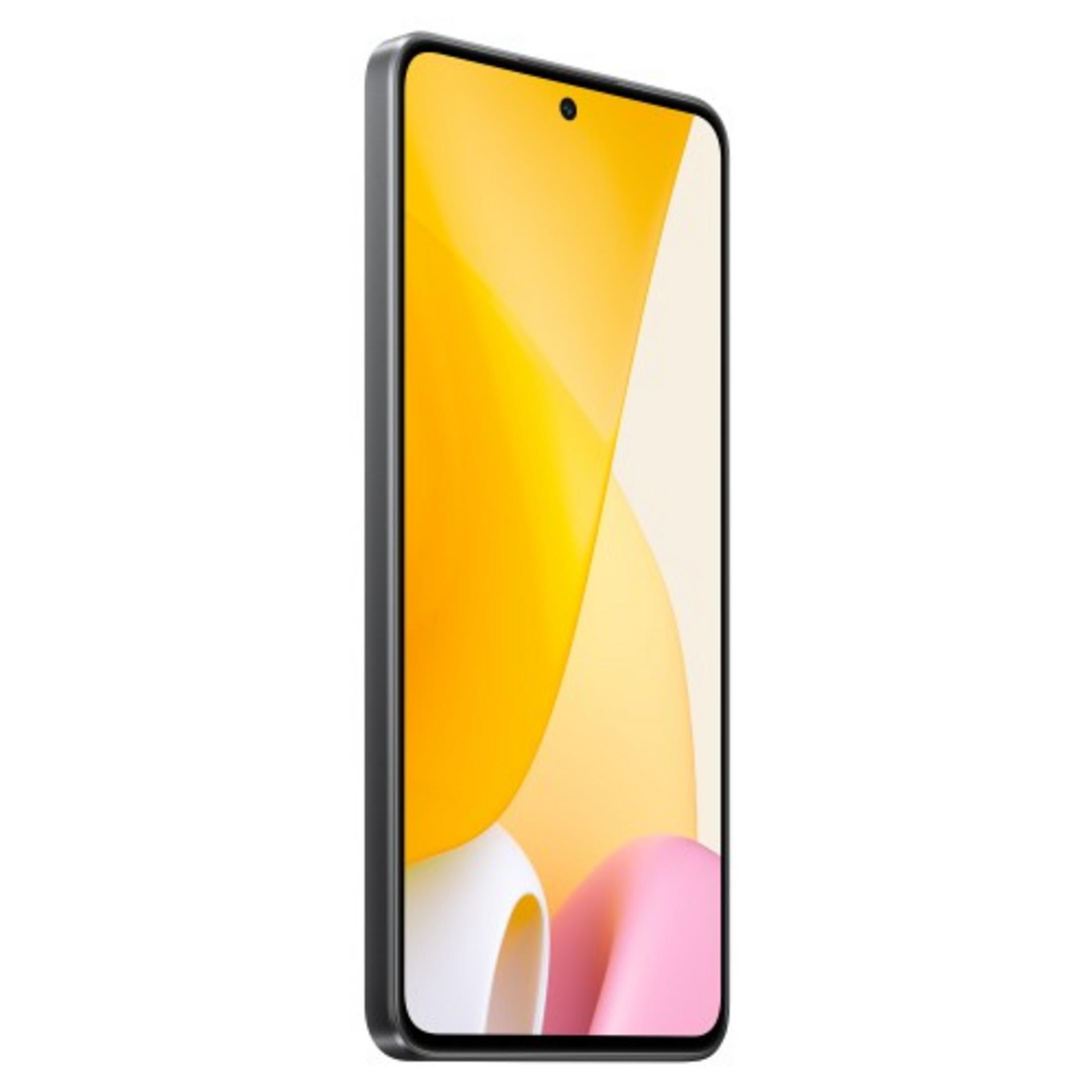 Un teléfono inteligente negro con un fondo de pantalla amarillo y blanco.