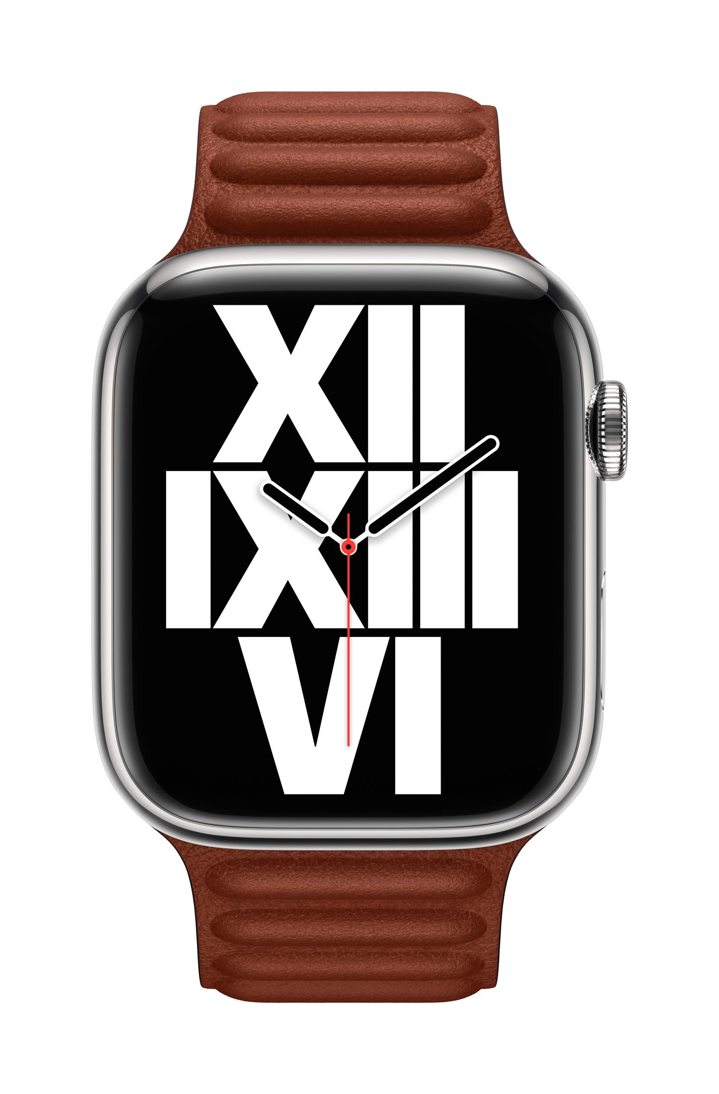 A silver smartwatch with a brown leather band and a black face with white Roman numerals.