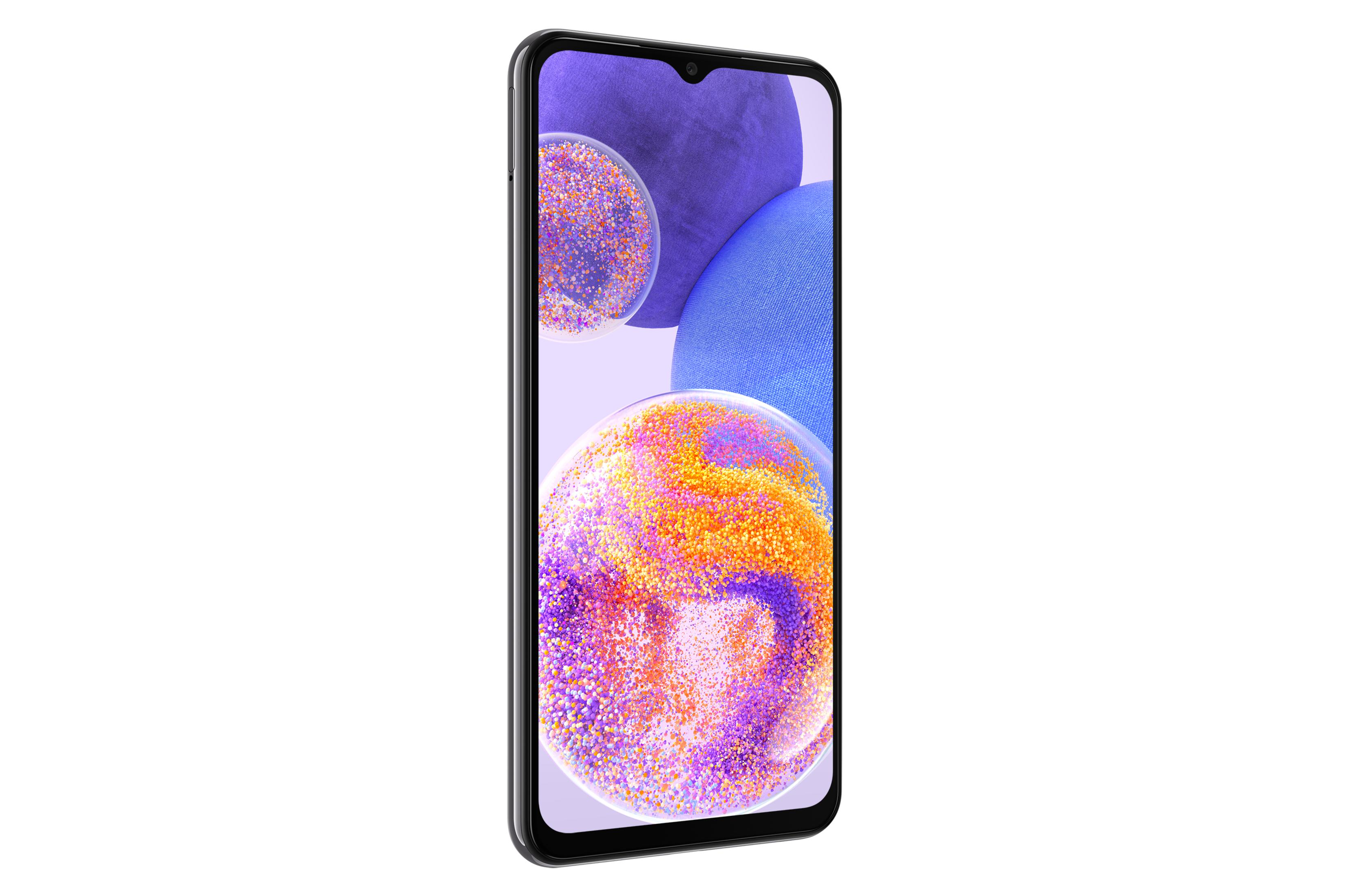 Renkli, soyut arka plana sahip siyah bir akıllı telefon.