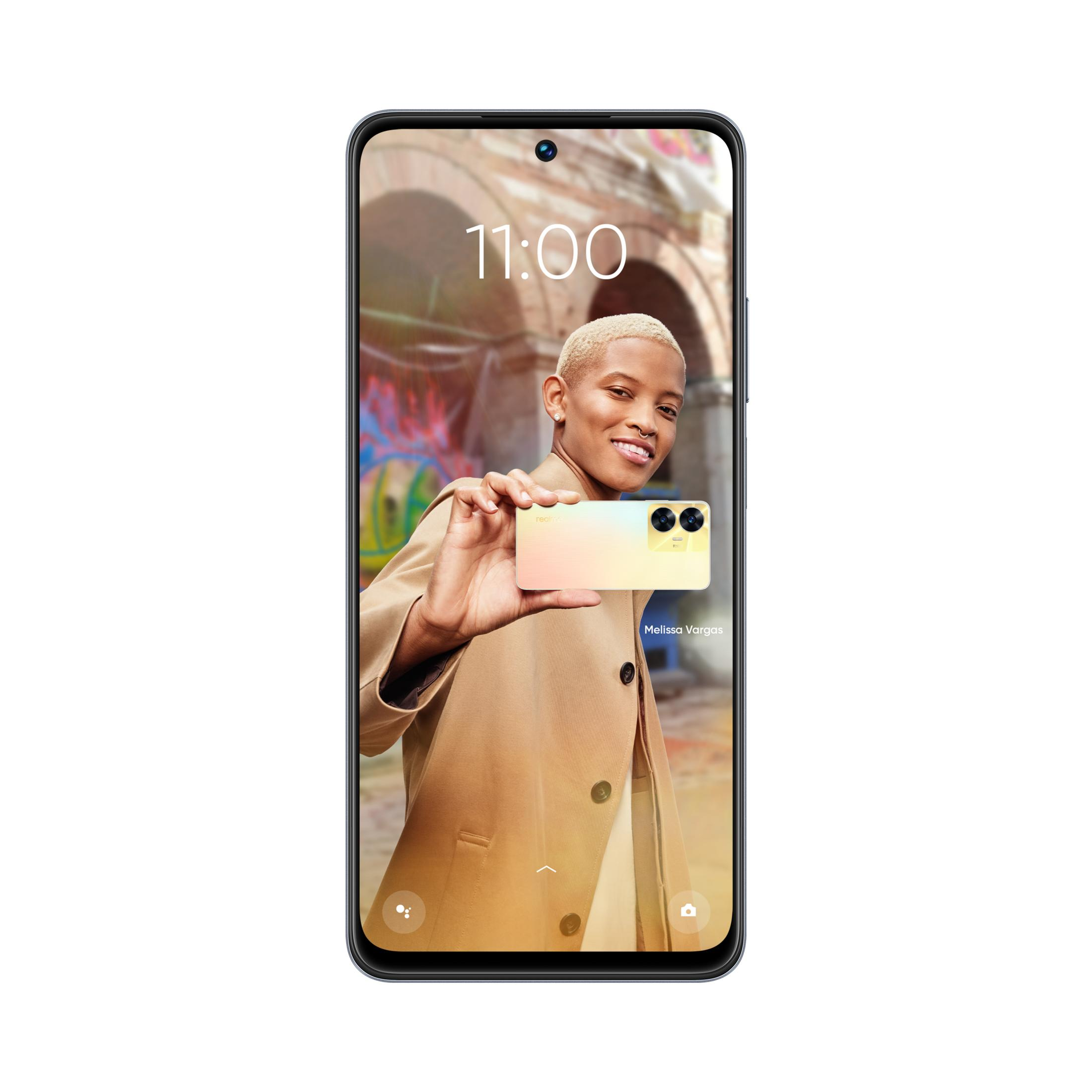 Bir kadın, arkasında 11:00 saatini ve renkli graffitiyi gösteren bir telefon tutuyor.