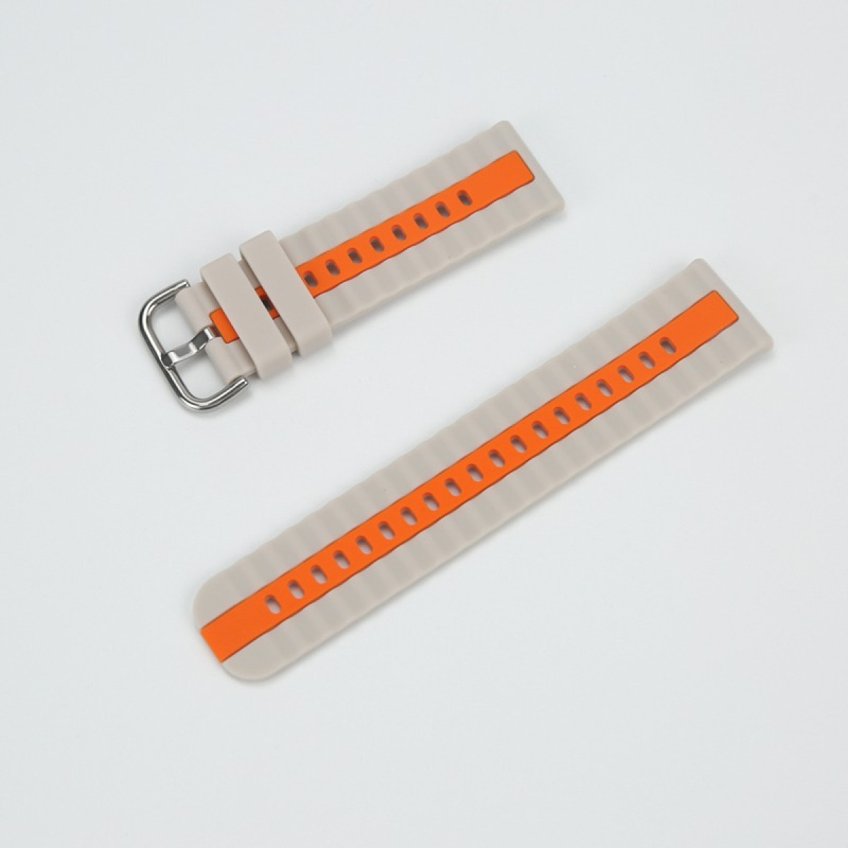 Zwei graue Uhrenarmbänder mit orangefarbenen Streifen und Löchern.