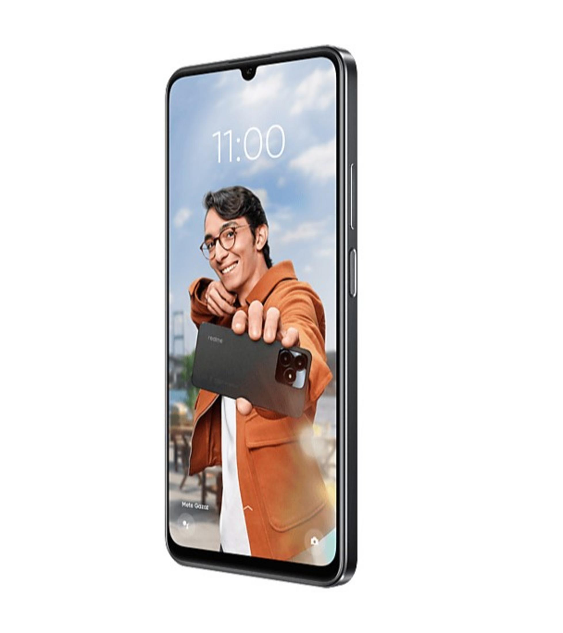 Gözlüklü adam, kamerası öne dönük akıllı telefonu tutuyor, mavi gökyüzü.