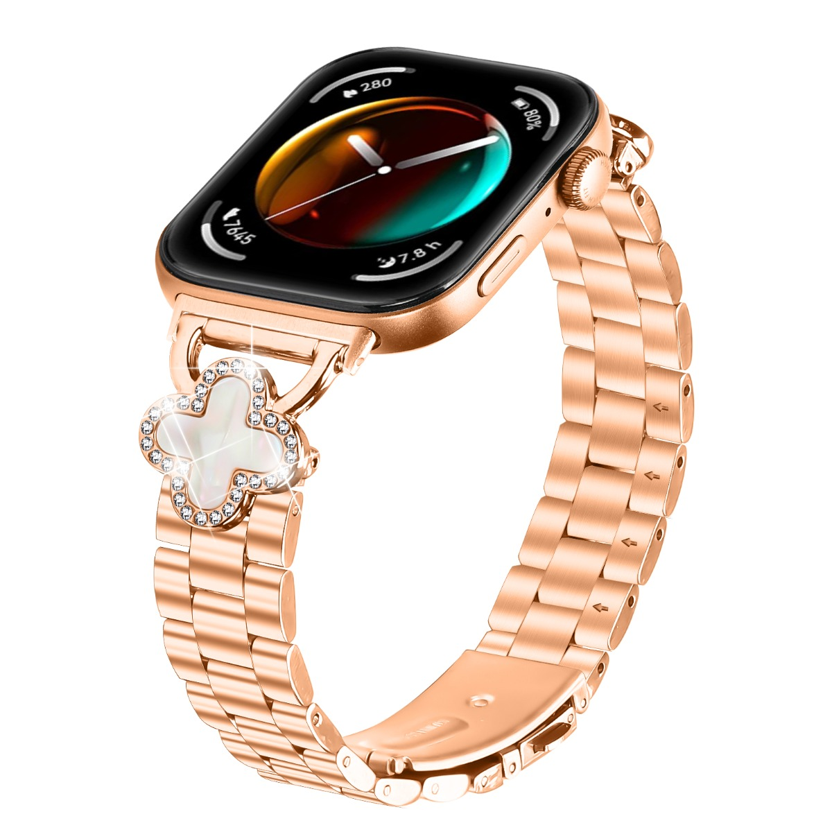 Eine roségoldene Smartwatch mit einem Kleeblatt-Anhänger, besetzt mit Kristallen.