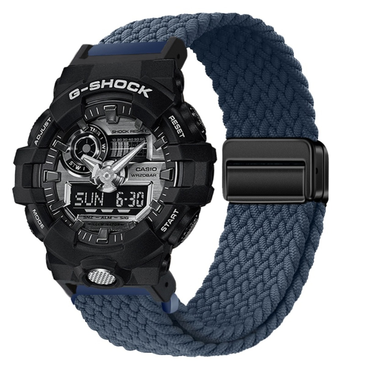 Schwarze G-Shock Uhr mit blauem Stoffarmband und silbernem Zifferblatt.
