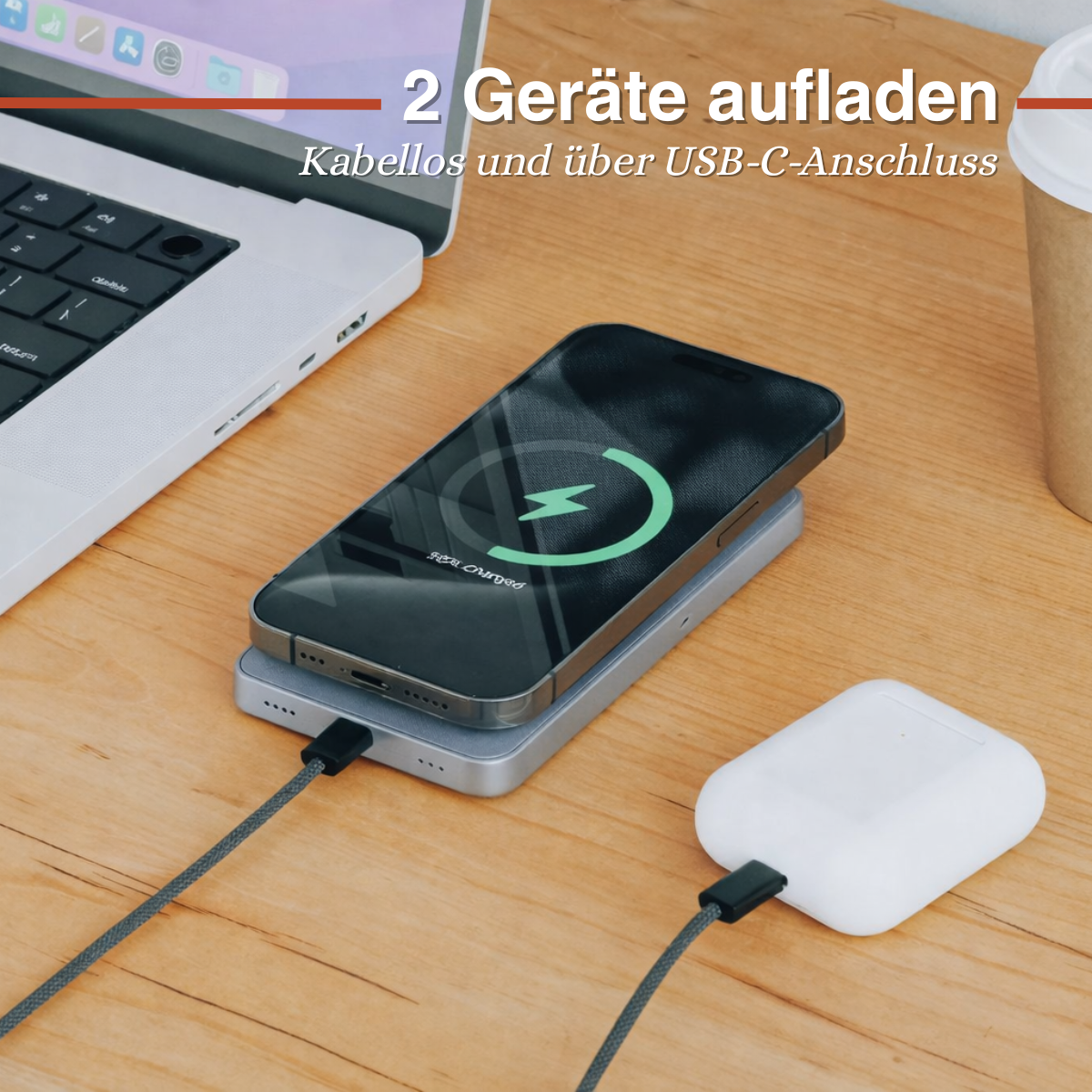 An iPhone and AirPods charging on a desk.
