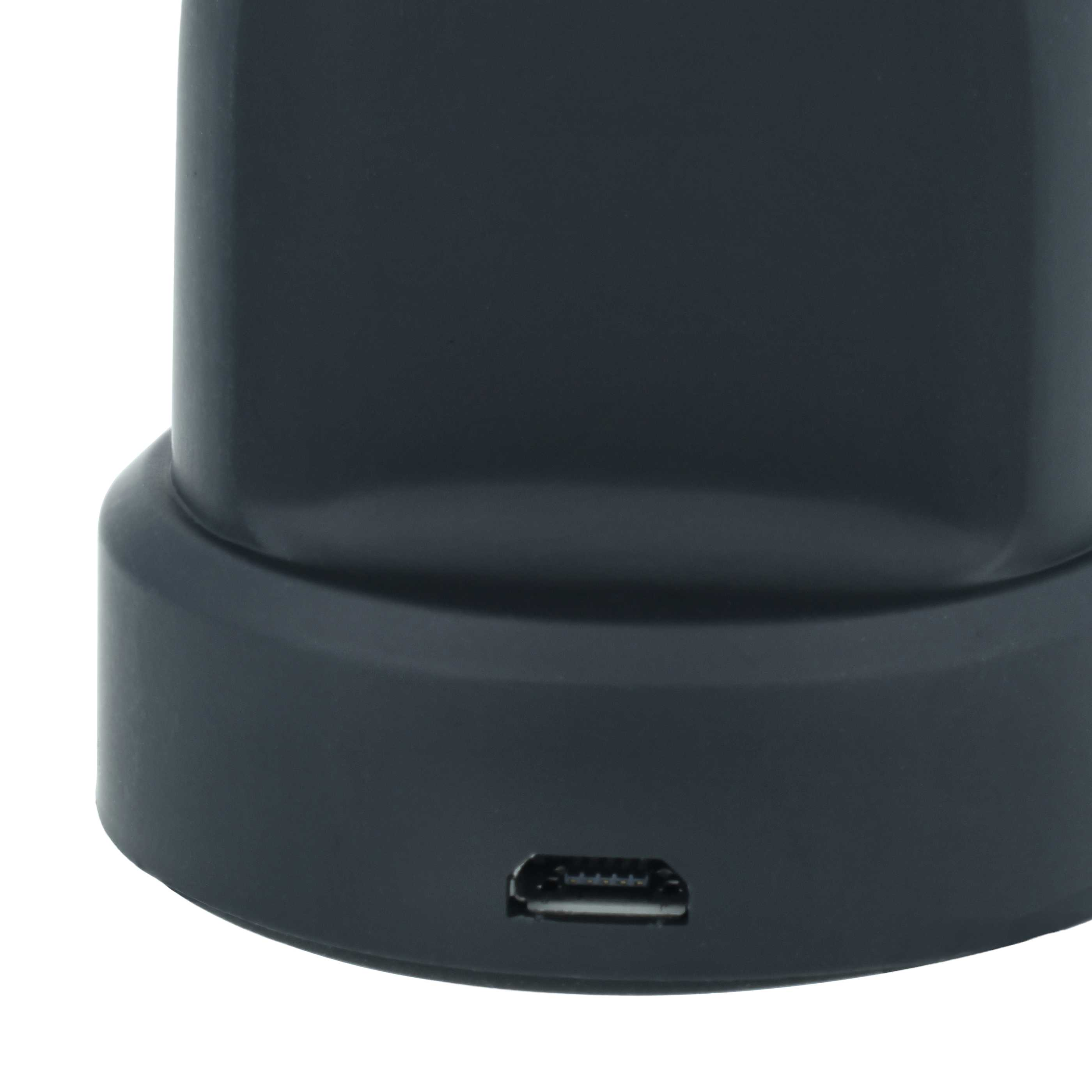 Nahaufnahme einer dunkelgrauen Gerätebasis mit einem Micro-USB-Anschluss vorne, auf weißem Hintergrund.