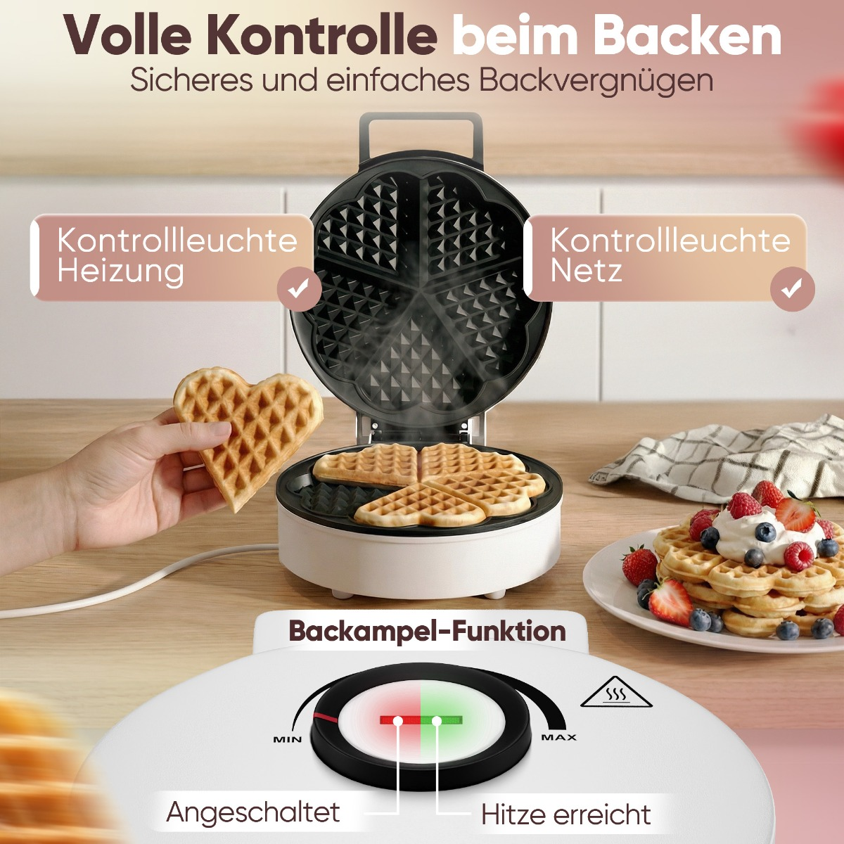 Herzförmige Waffeln werden in einer Waffelmaschine gebacken. Kontrollleuchten und Temperaturanzeige.