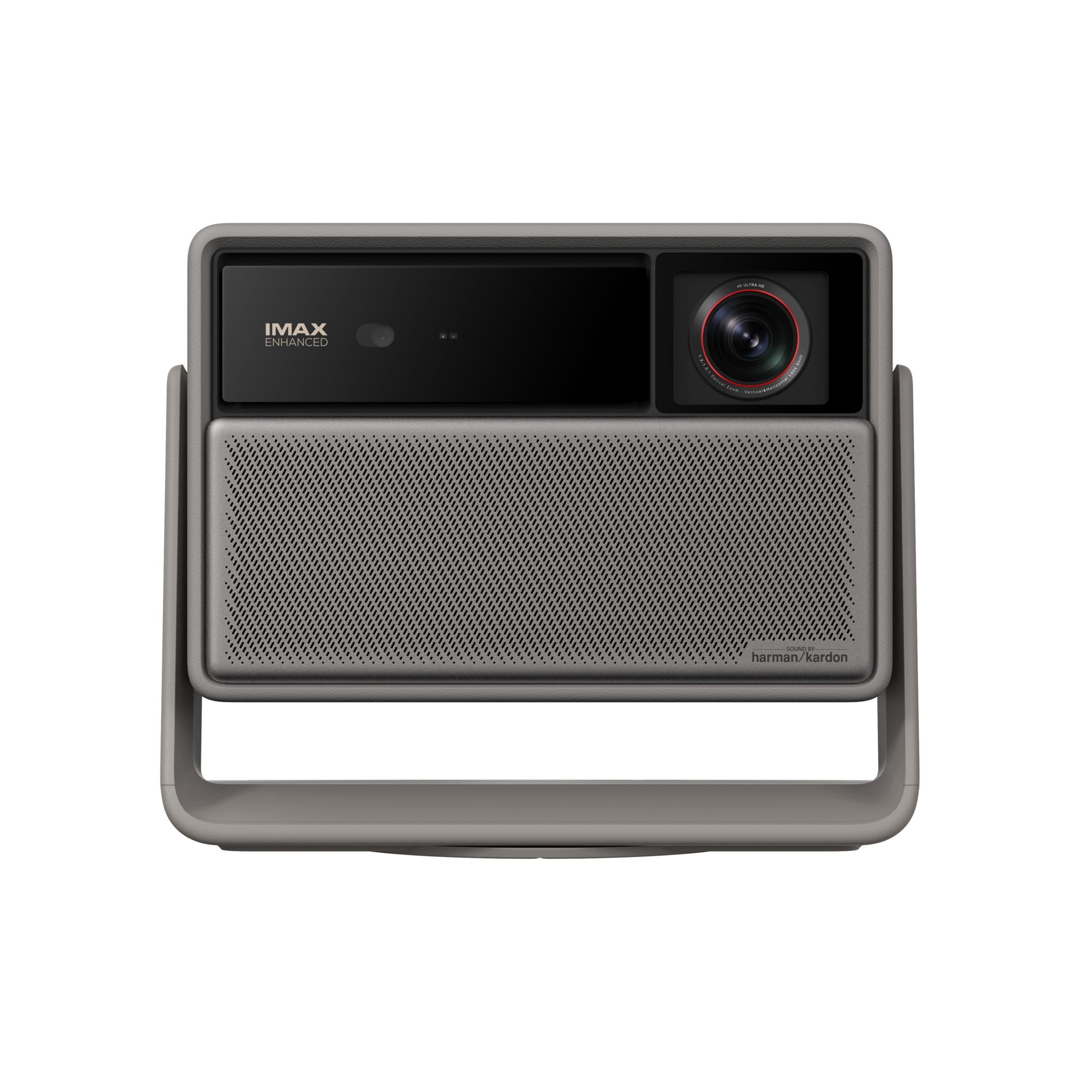 Gray projector with IMAX Enhanced logo, lens, and Harman Kardon speaker.
