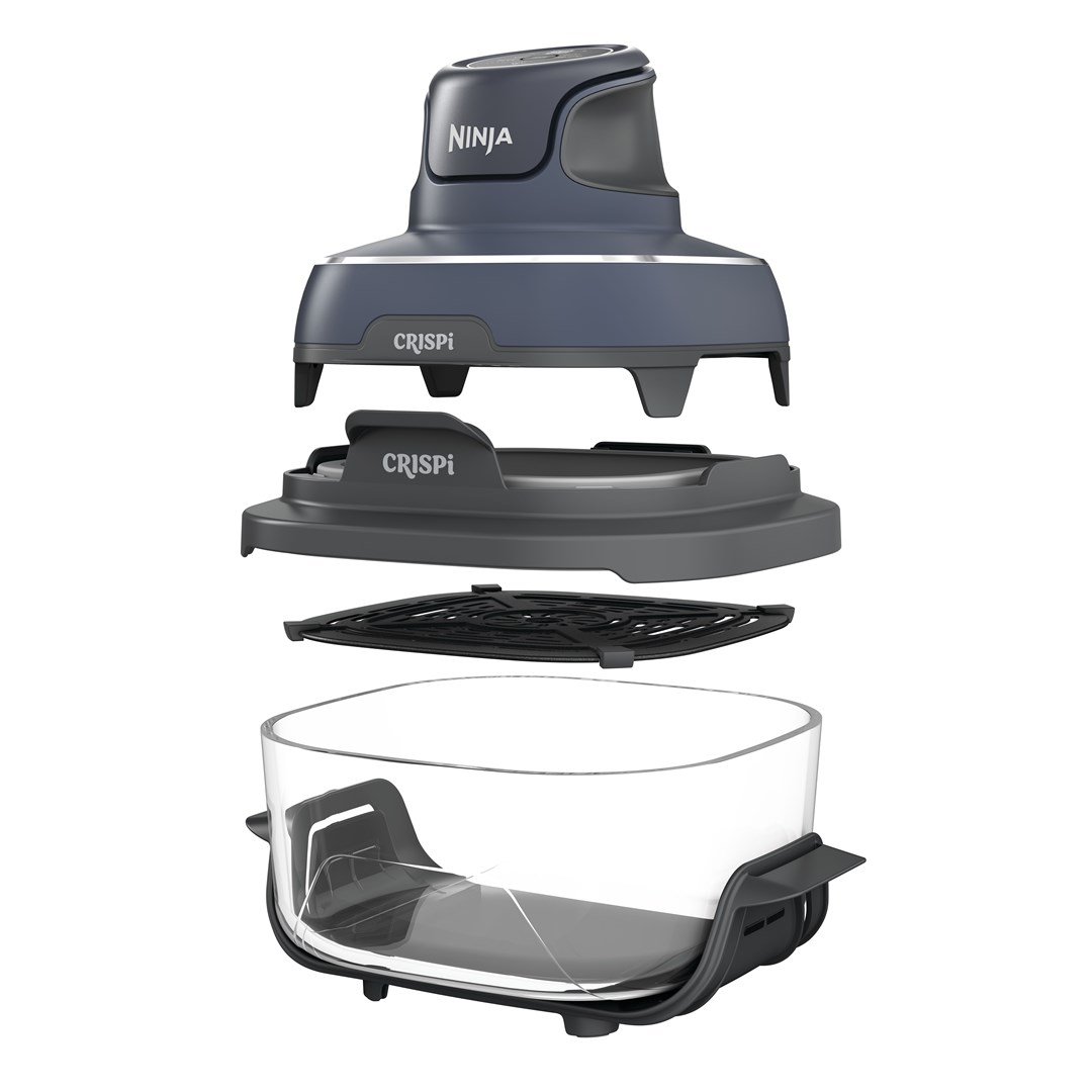 Rozłożona pokrywa, wkład i kosz frytkownicy beztłuszczowej Ninja Crispi.