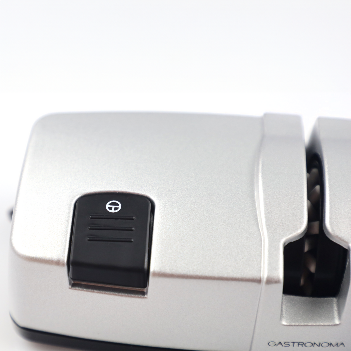 Srebrna elektryczna ostrzałka do noży z czarnym przyciskiem i logo Gastronoma.