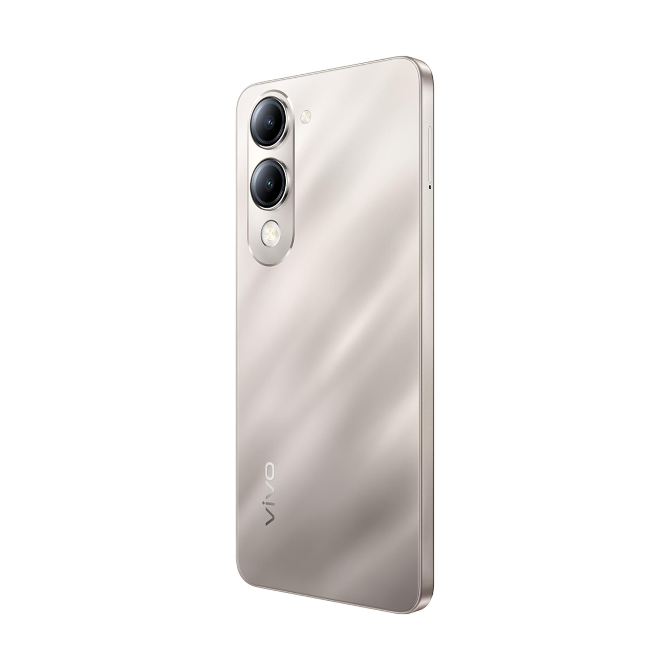Üç kamerası ve VIVO logosu olan açık bej bir akıllı telefonun arkası.