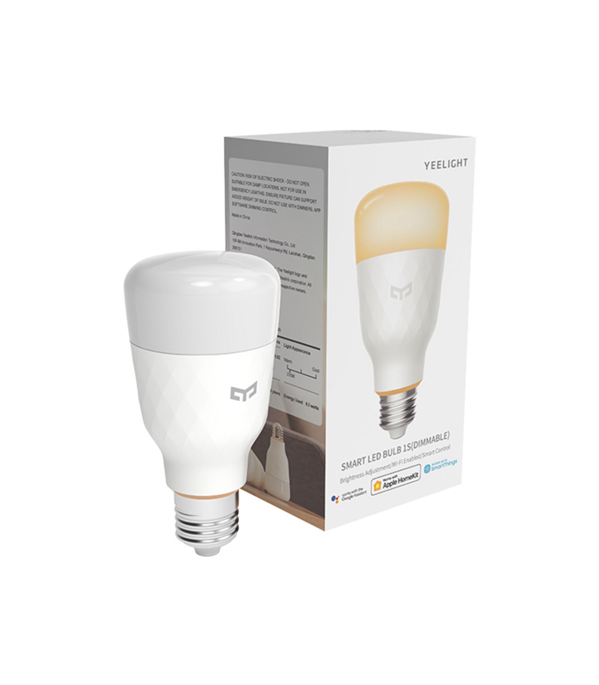 Białe pudełko inteligentnej żarówki LED Yeelight z żarówką obok.