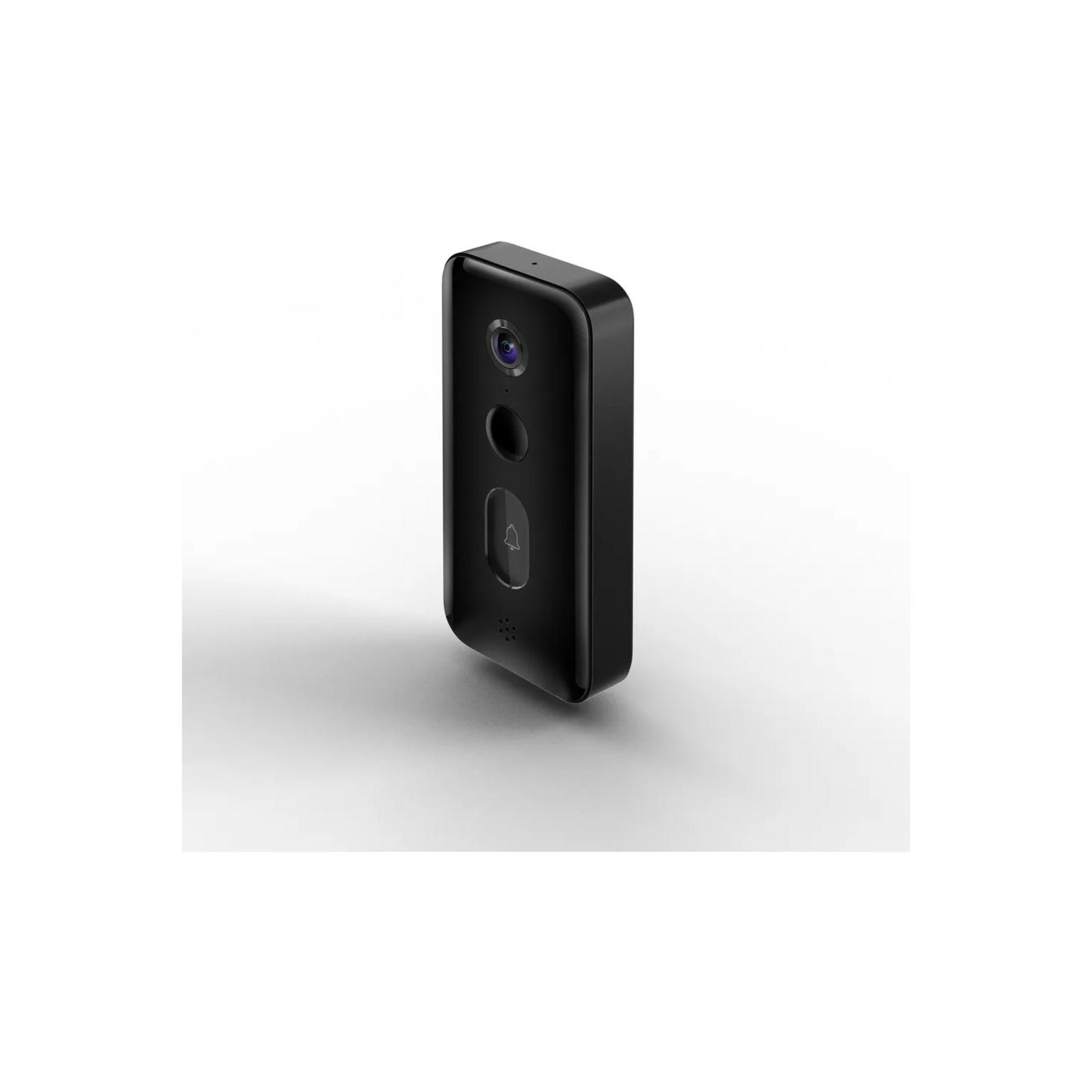 Czarna kamera dzwonka do drzwi z obiektywem, przyciskiem i maskownicą głośnika.