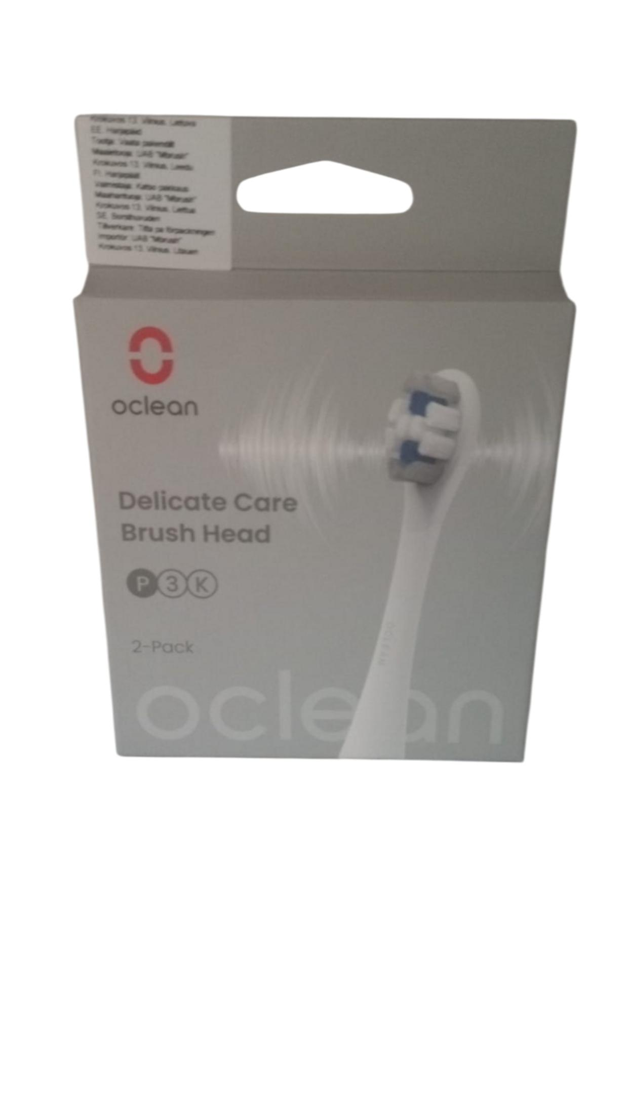 Oclean Delicate Care Bürstenkopf 2er Packung, weißer Griff mit blauen Borsten.