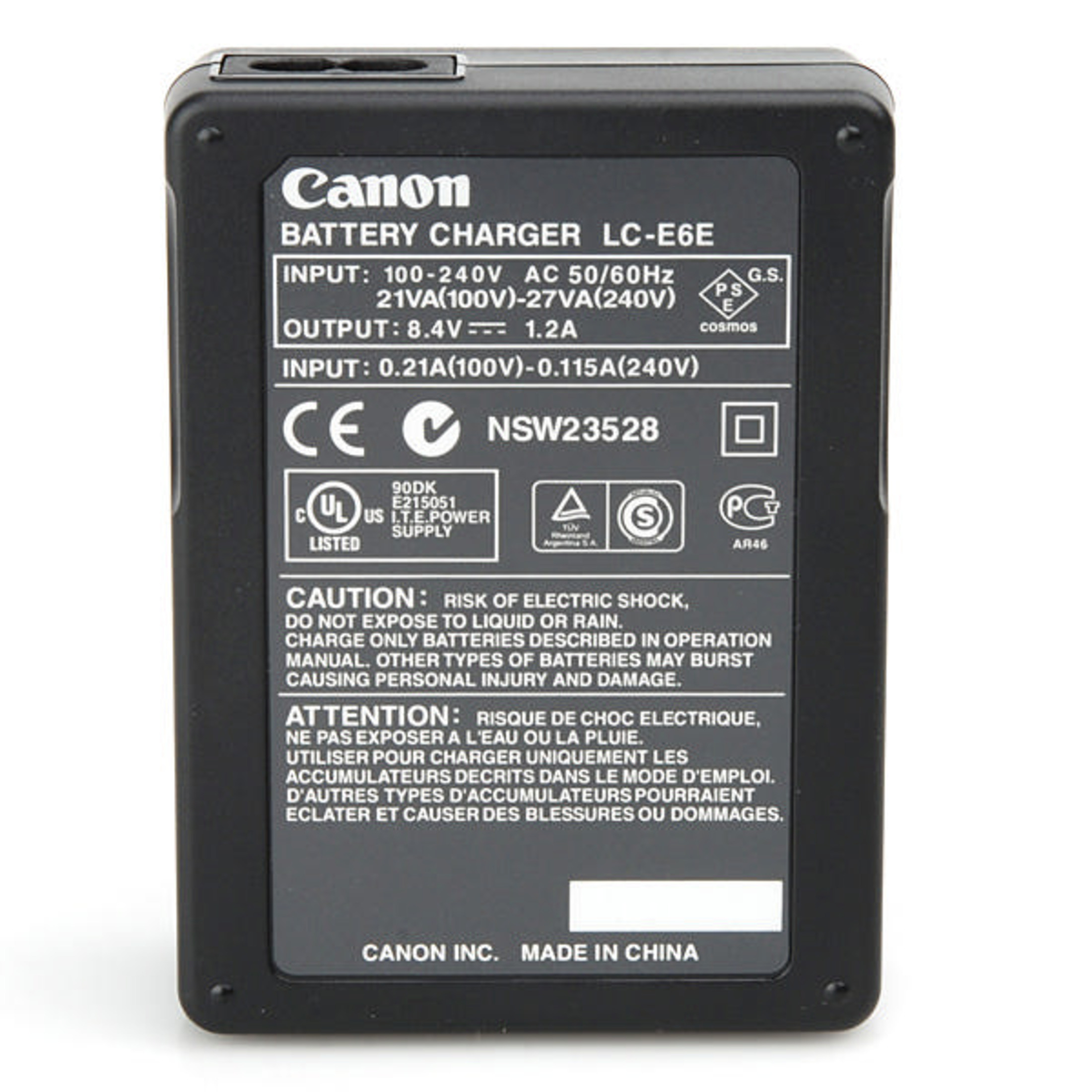 Cargador de batería Canon LC-E6E negro con especificaciones y advertencias.