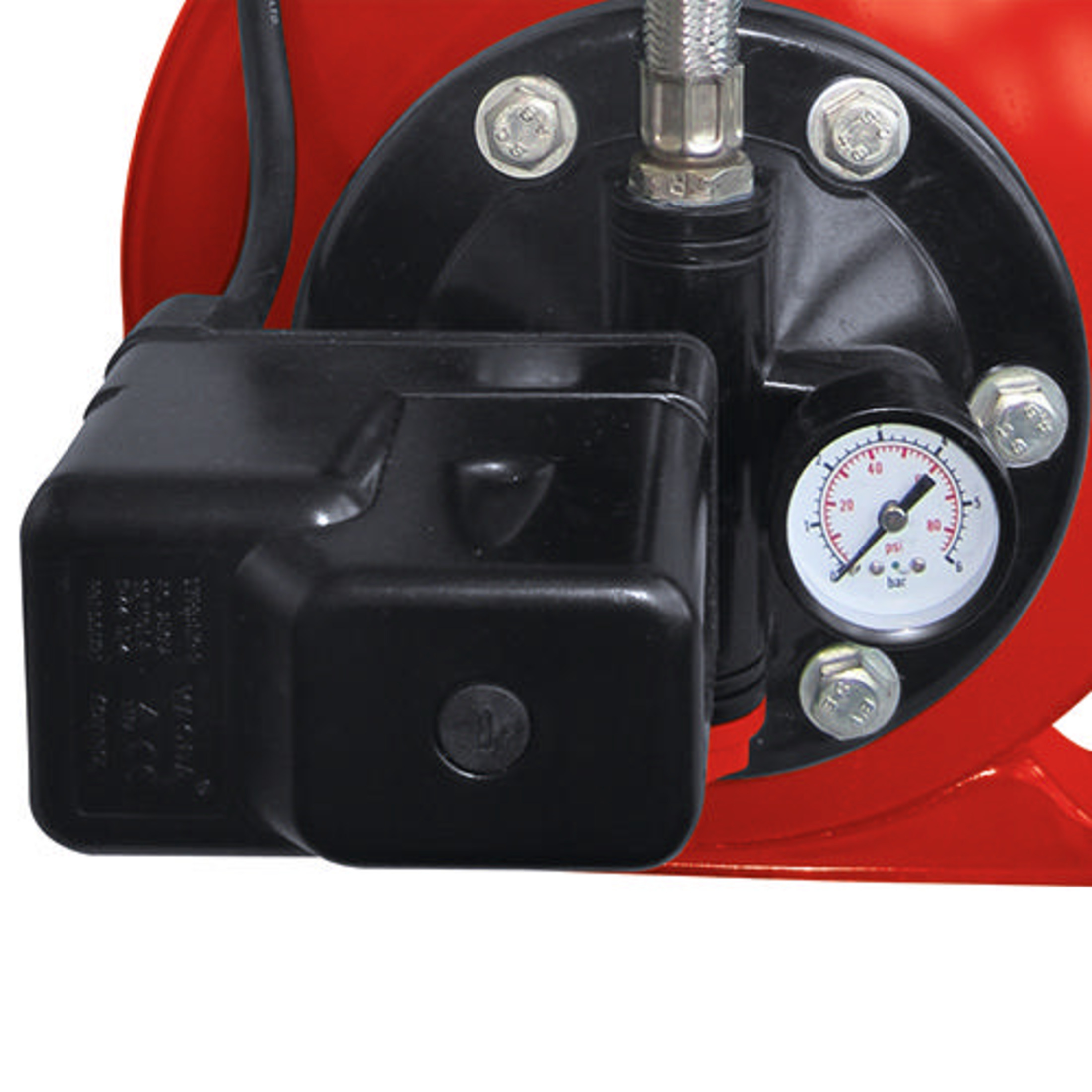 Ein roter Behälter mit schwarzem Kasten und Manometer.