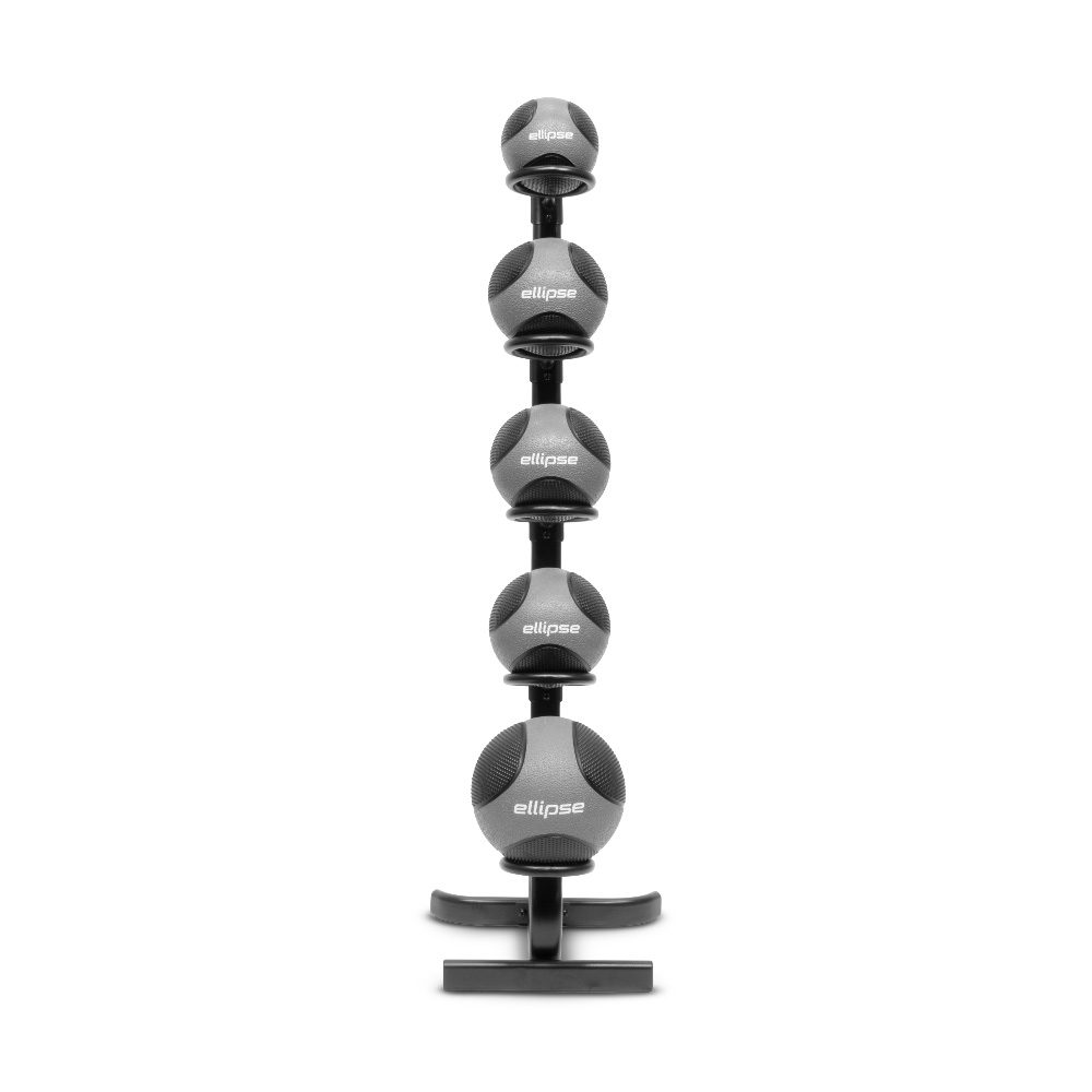 Un soporte con cuatro balones medicinales grises apilados verticalmente.