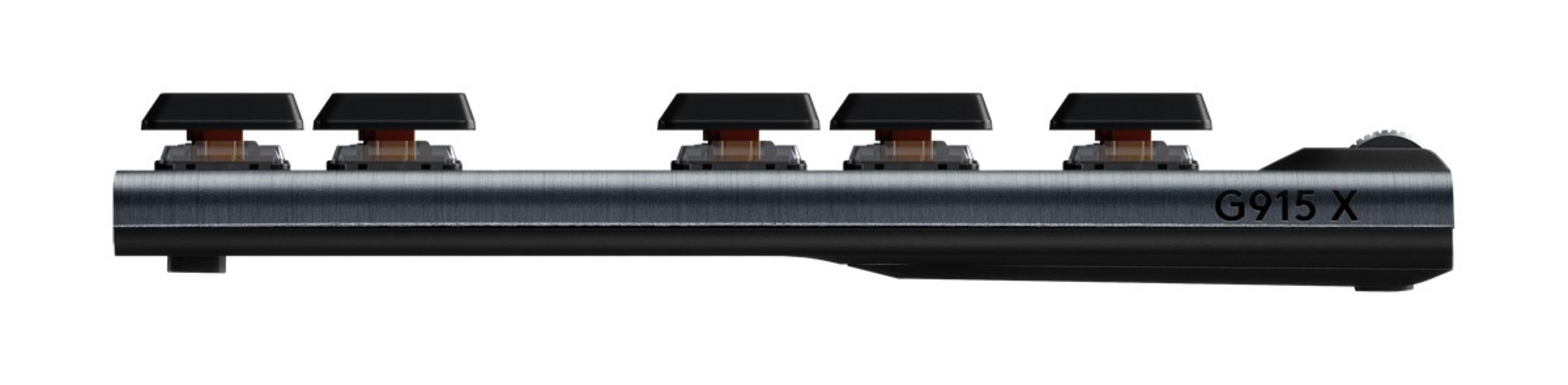 Zbliżenie klawiatury z czarnymi klawiszami i widocznymi przełącznikami.