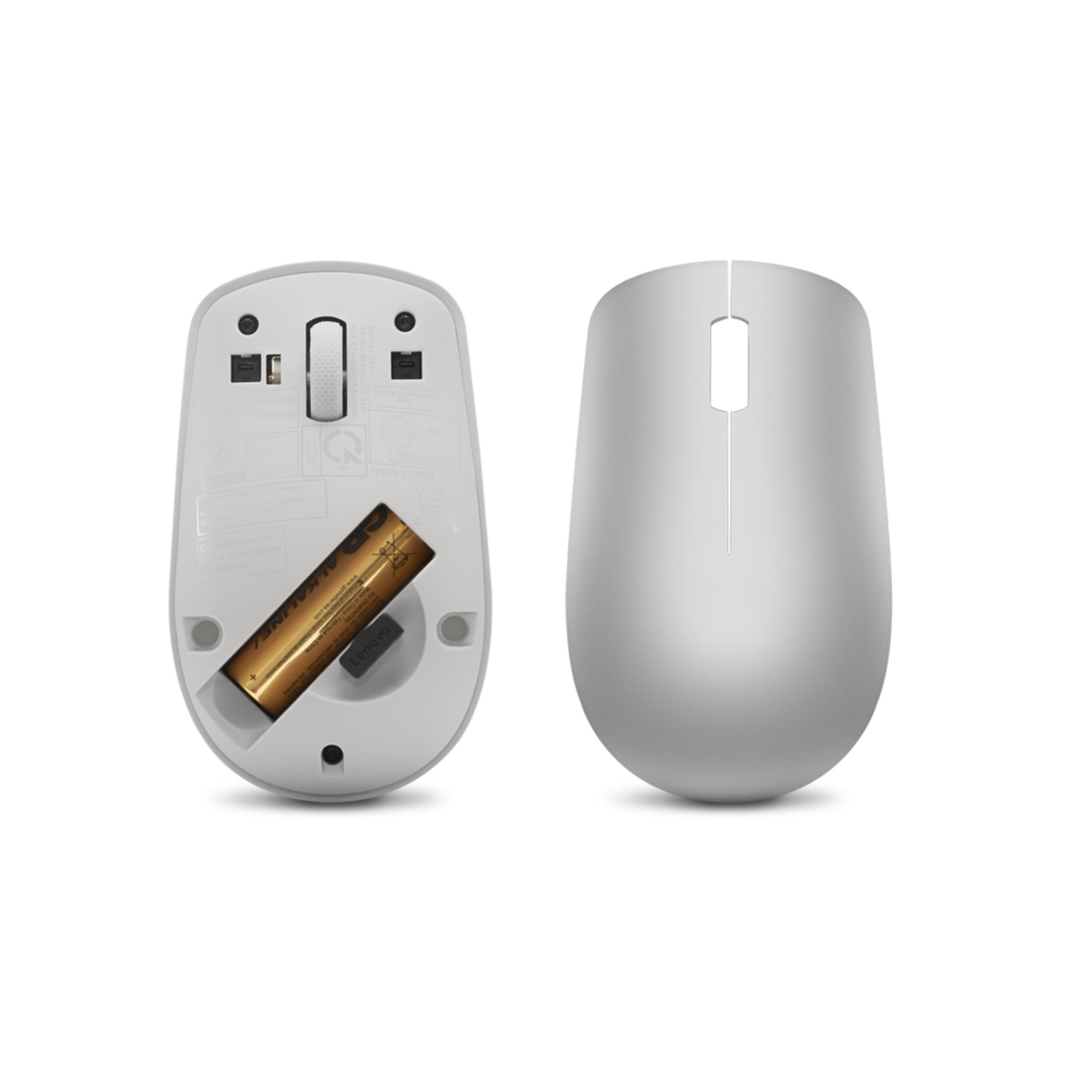 Two views of a white computer mouse, one showing the battery compartment and battery.